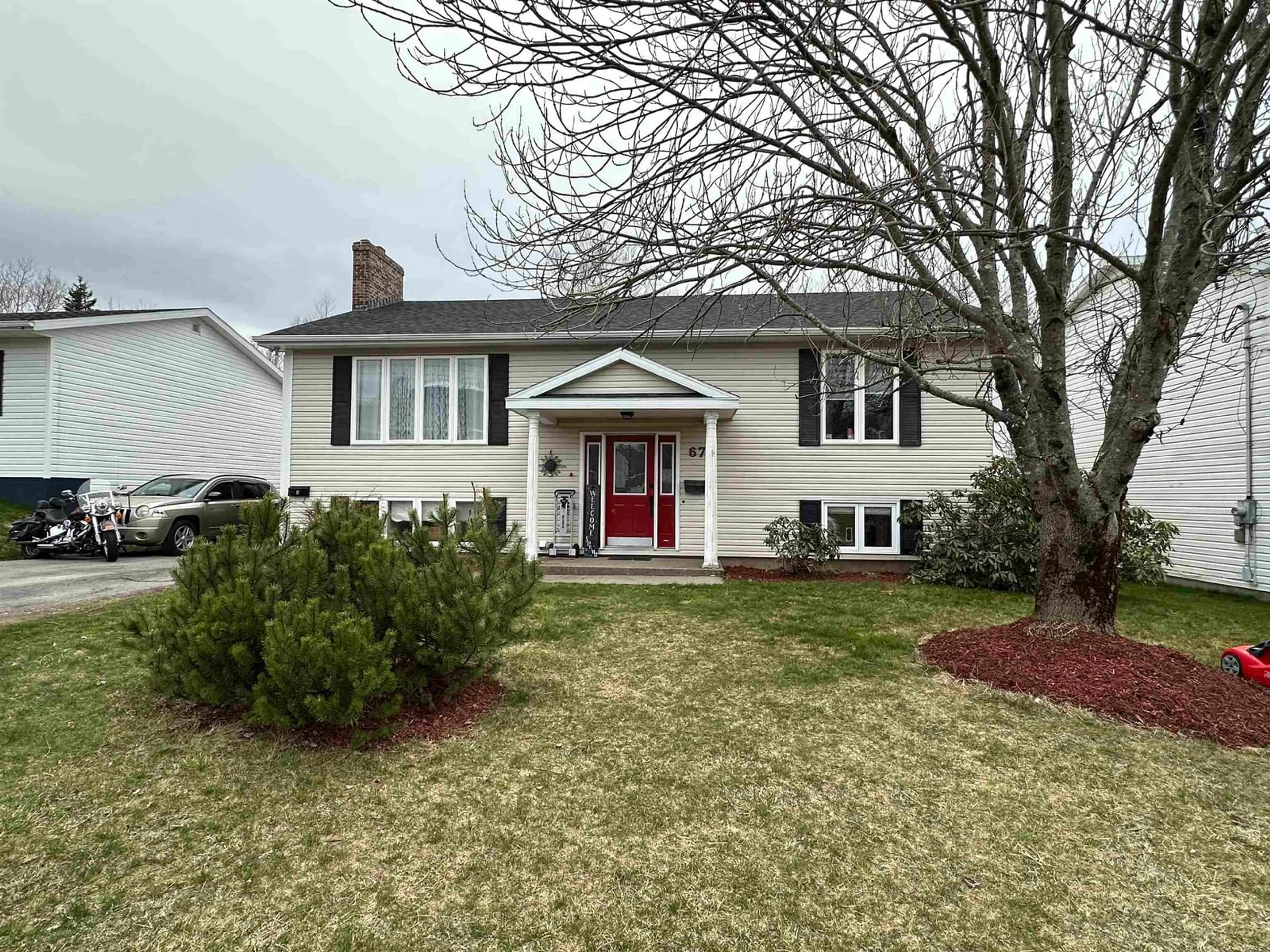 Home with vinyl exterior material, street for 67 Melissa Cres, Sydney Nova Scotia B1P 6X1