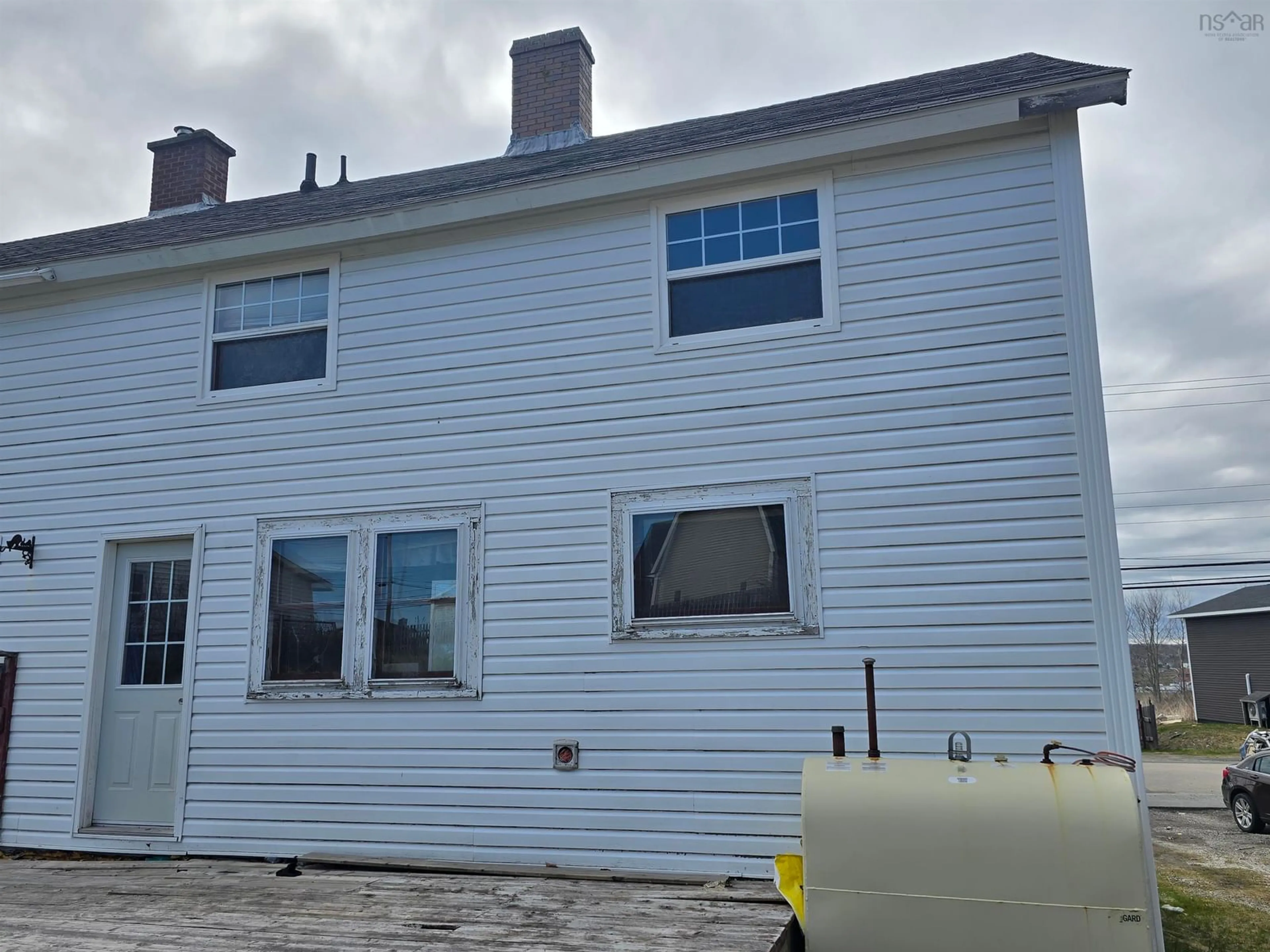 Home with vinyl exterior material, building for 98 Richmond St, Sydney Nova Scotia B1P 2V2