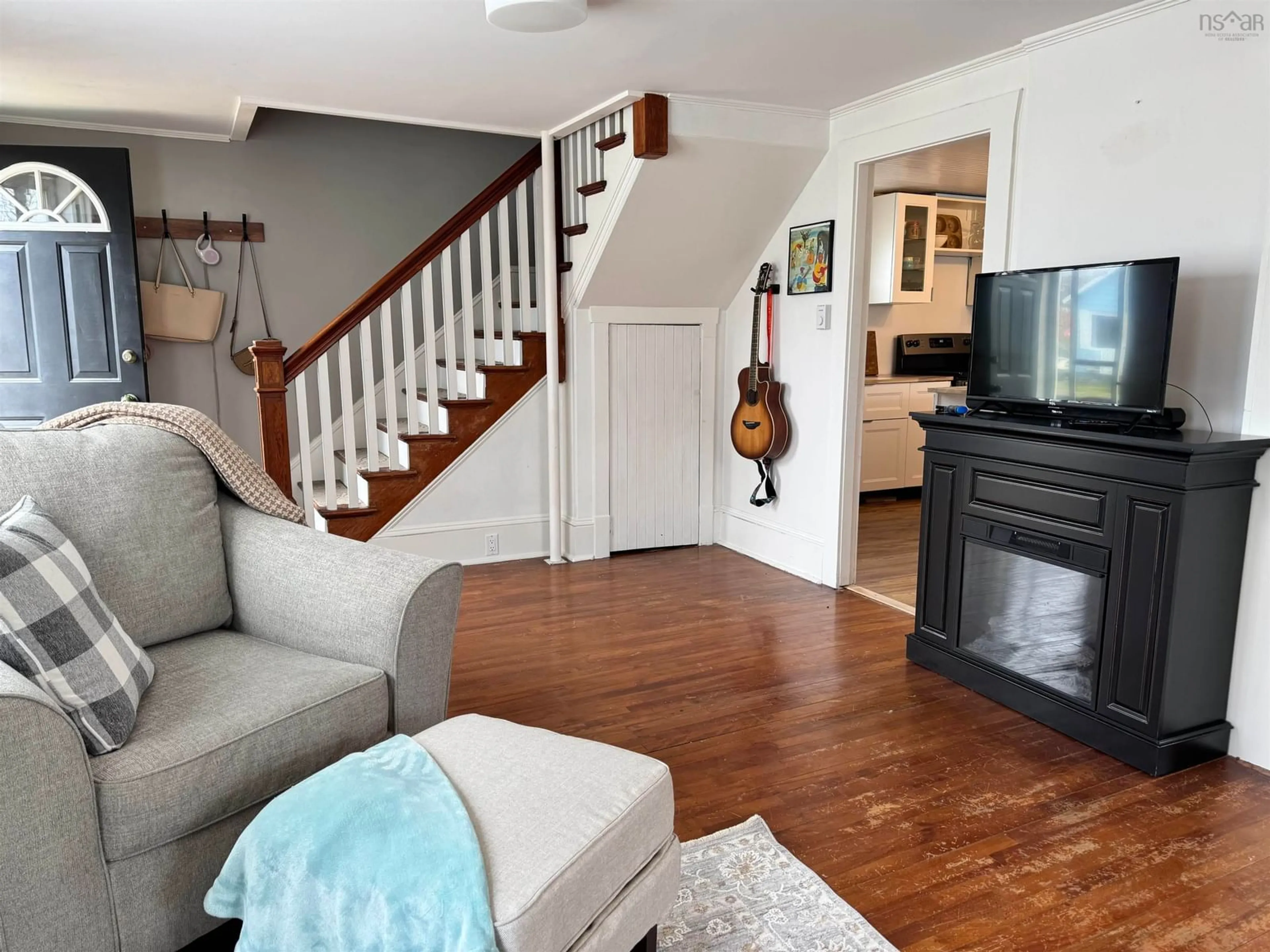 Living room with furniture, wood/laminate floor for 188 Alexander St, Glace Bay Nova Scotia B1A 4A7