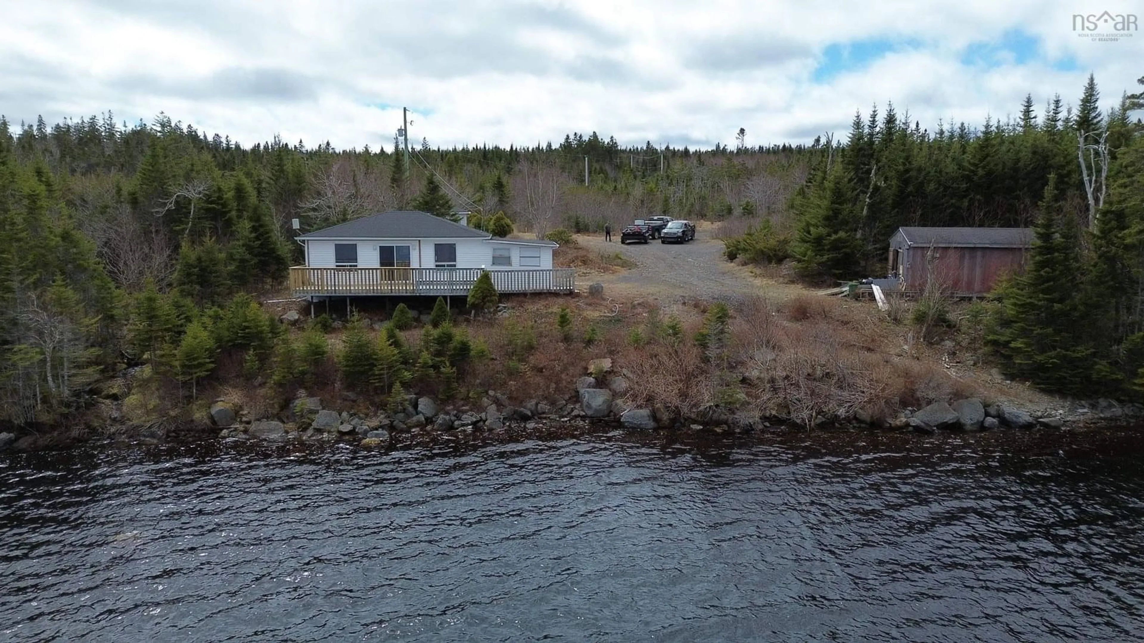 A pic from outside/outdoor area/front of a property/back of a property/a pic from drone, water/lake/river/ocean view for 2230 Larrys River Rd, Lundy Nova Scotia B0H 1N0