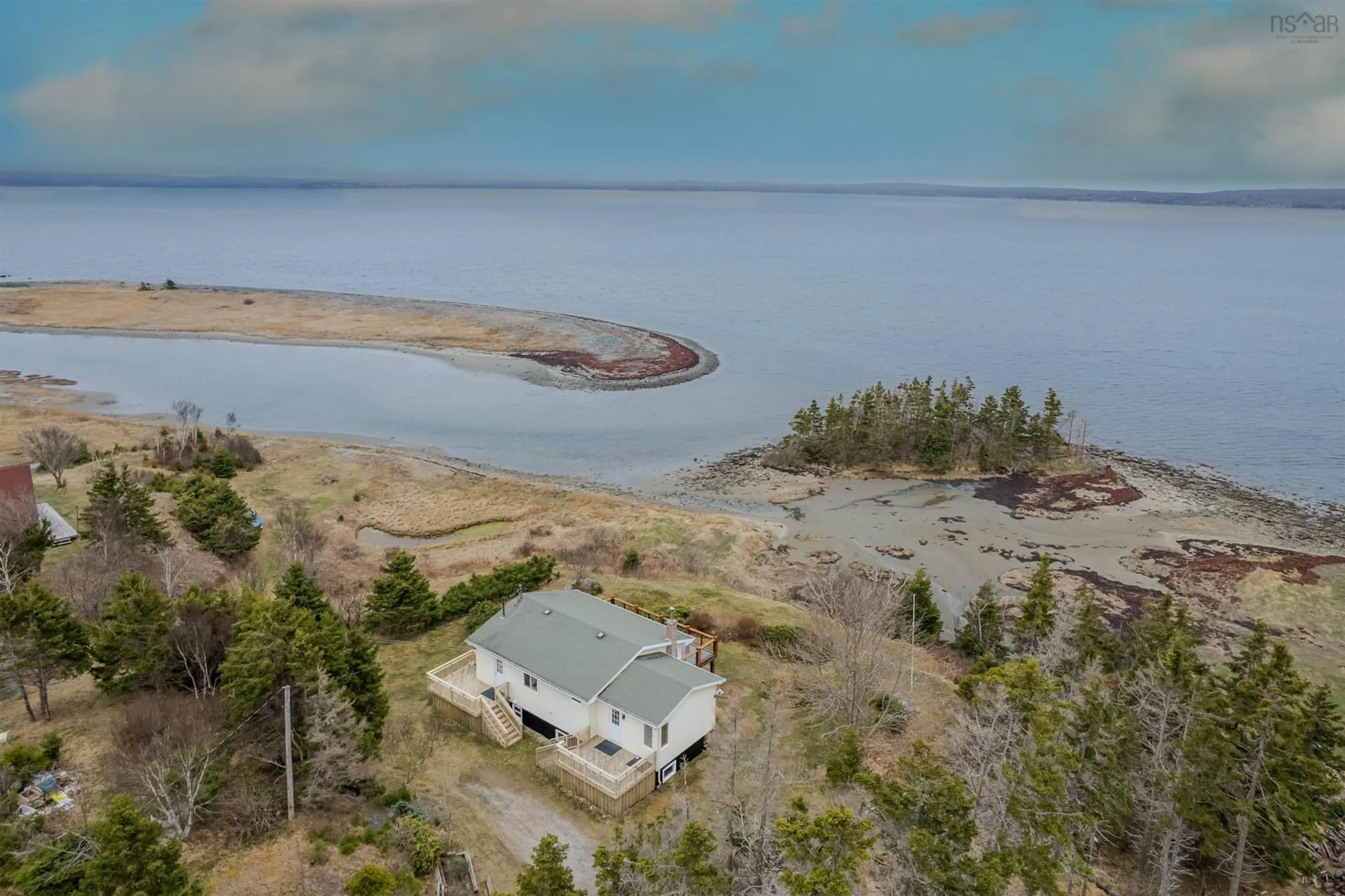 A pic from outside/outdoor area/front of a property/back of a property/a pic from drone, water/lake/river/ocean view for 130 Scottsdale Lane, Round Island Nova Scotia B1B 1P7
