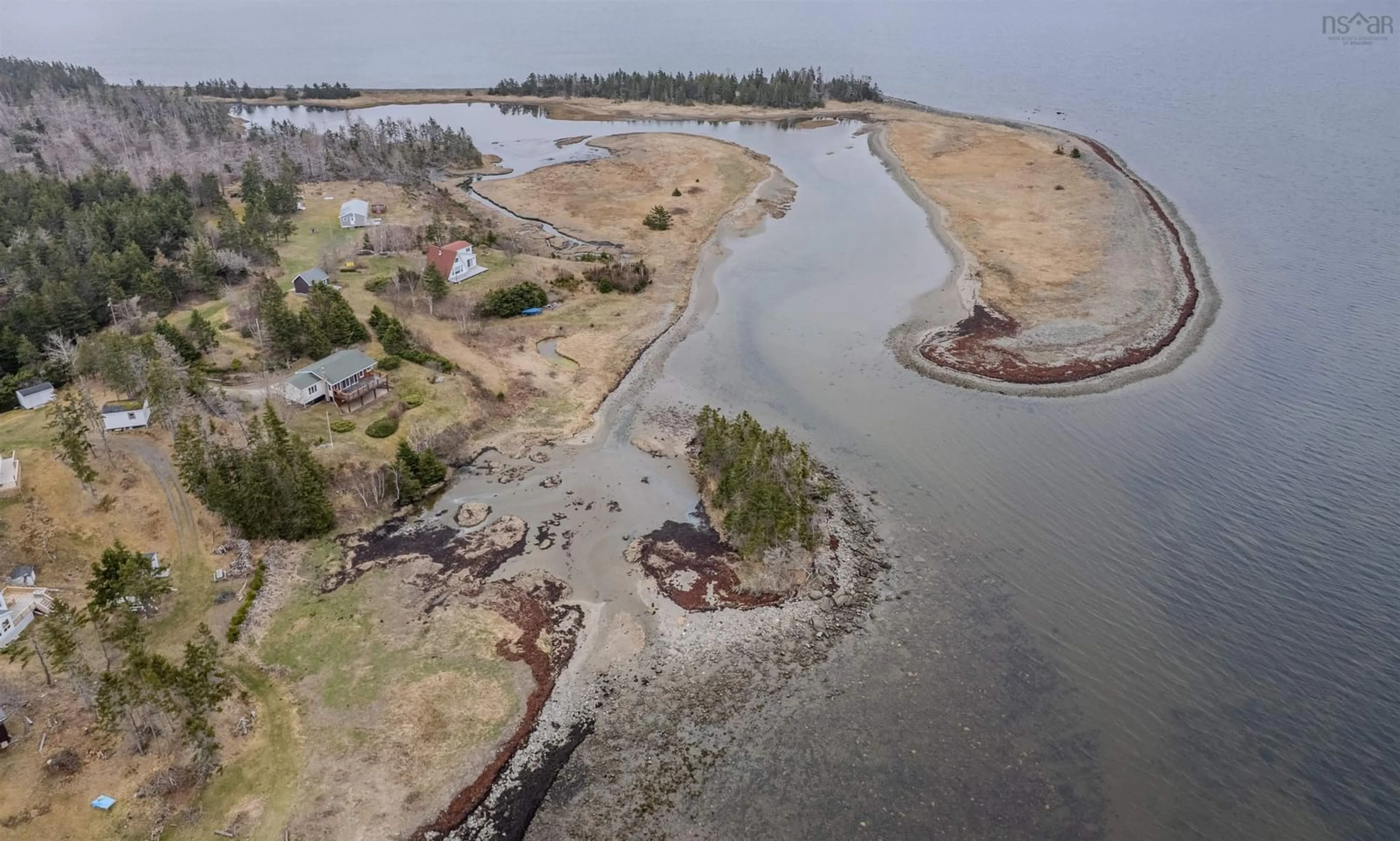 A pic from outside/outdoor area/front of a property/back of a property/a pic from drone, water/lake/river/ocean view for 130 Scottsdale Lane, Round Island Nova Scotia B1B 1P7