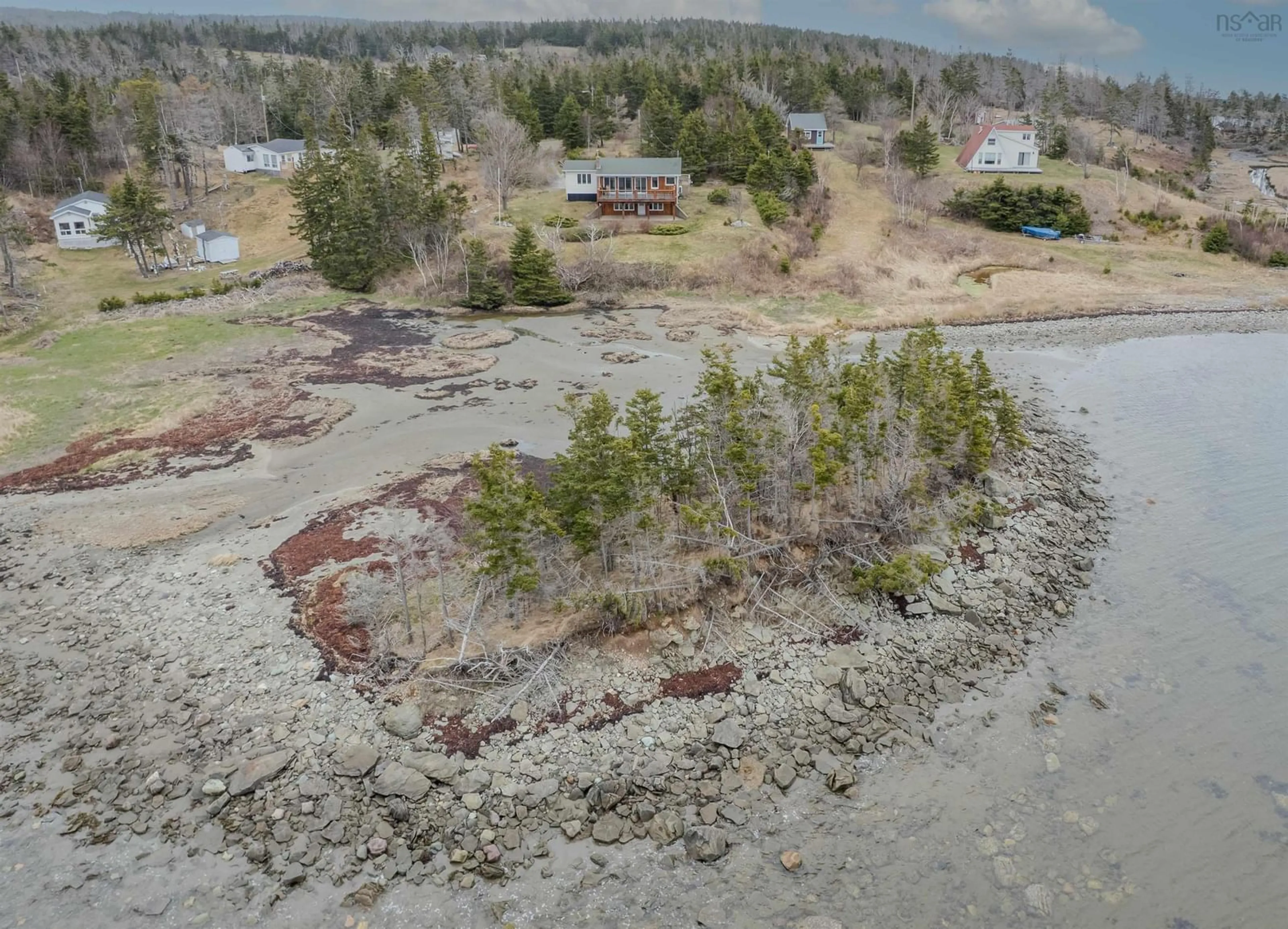 A pic from outside/outdoor area/front of a property/back of a property/a pic from drone, water/lake/river/ocean view for 130 Scottsdale Lane, Round Island Nova Scotia B1B 1P7