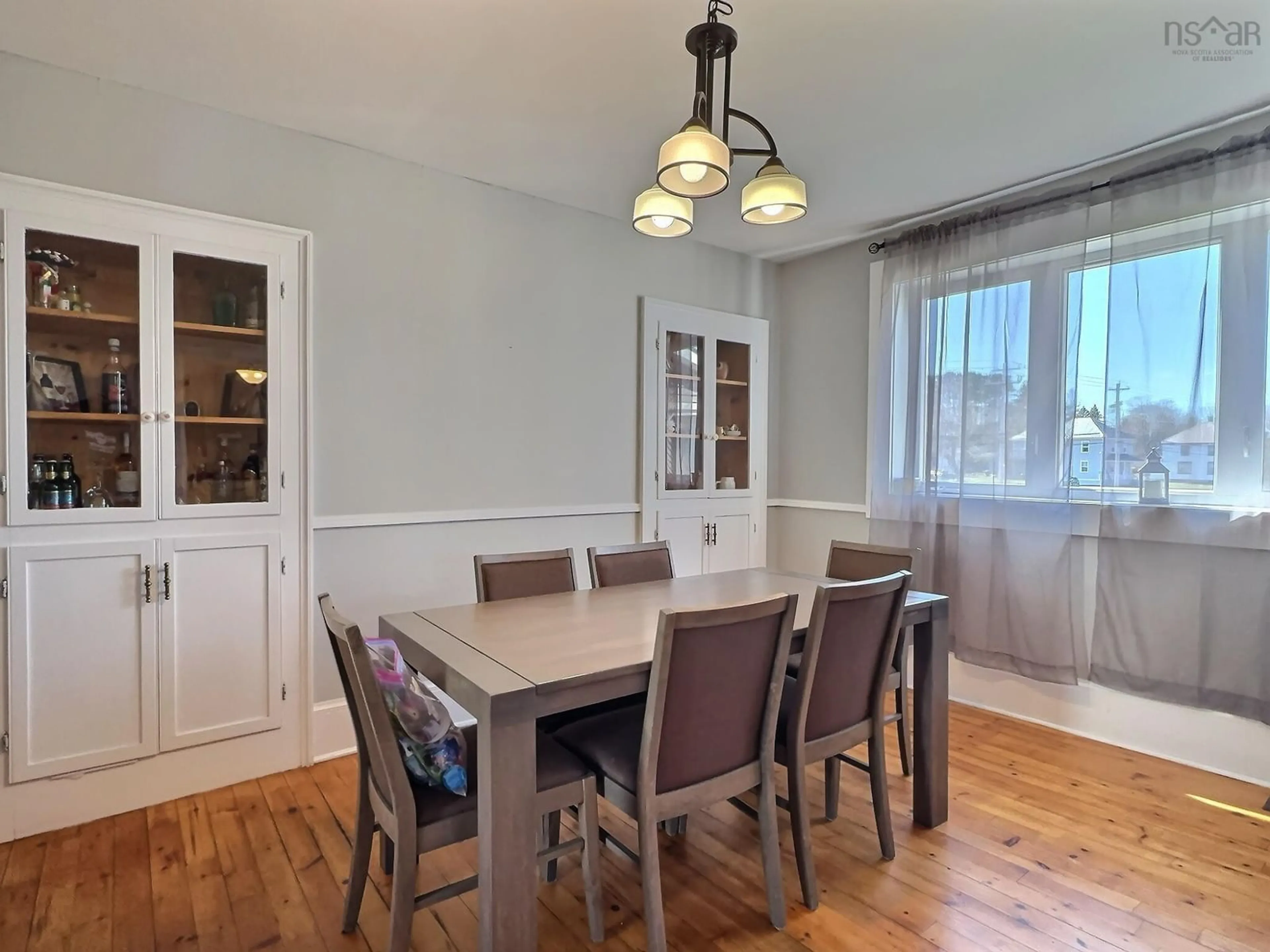 Dining room, wood/laminate floor for 1429 East Prince St, Salmon River Nova Scotia B2N 6M7