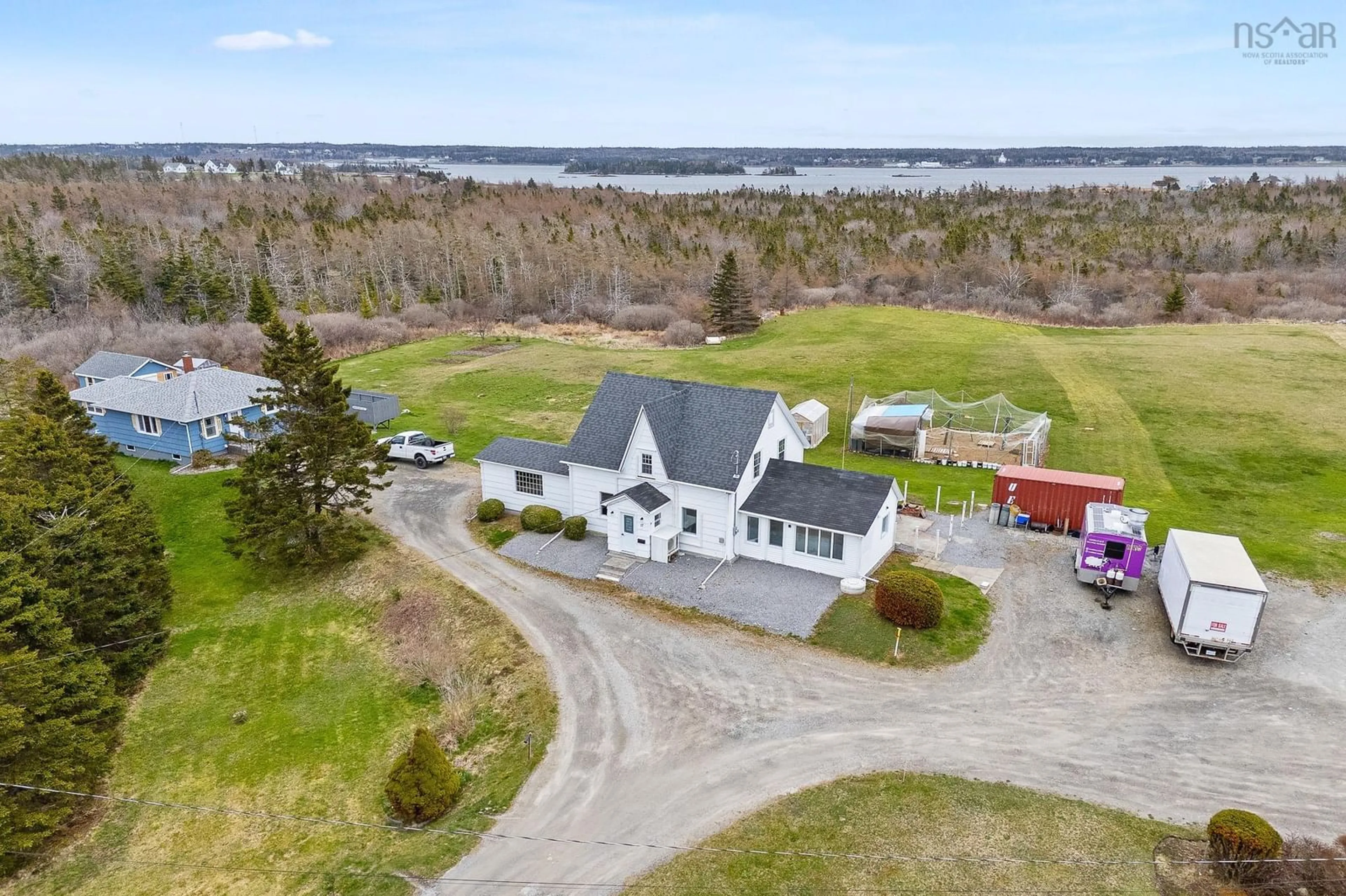 A pic from outside/outdoor area/front of a property/back of a property/a pic from drone, water/lake/river/ocean view for 17 Ponderosa Lane, Lower West Pubnico Nova Scotia B0W 2M0