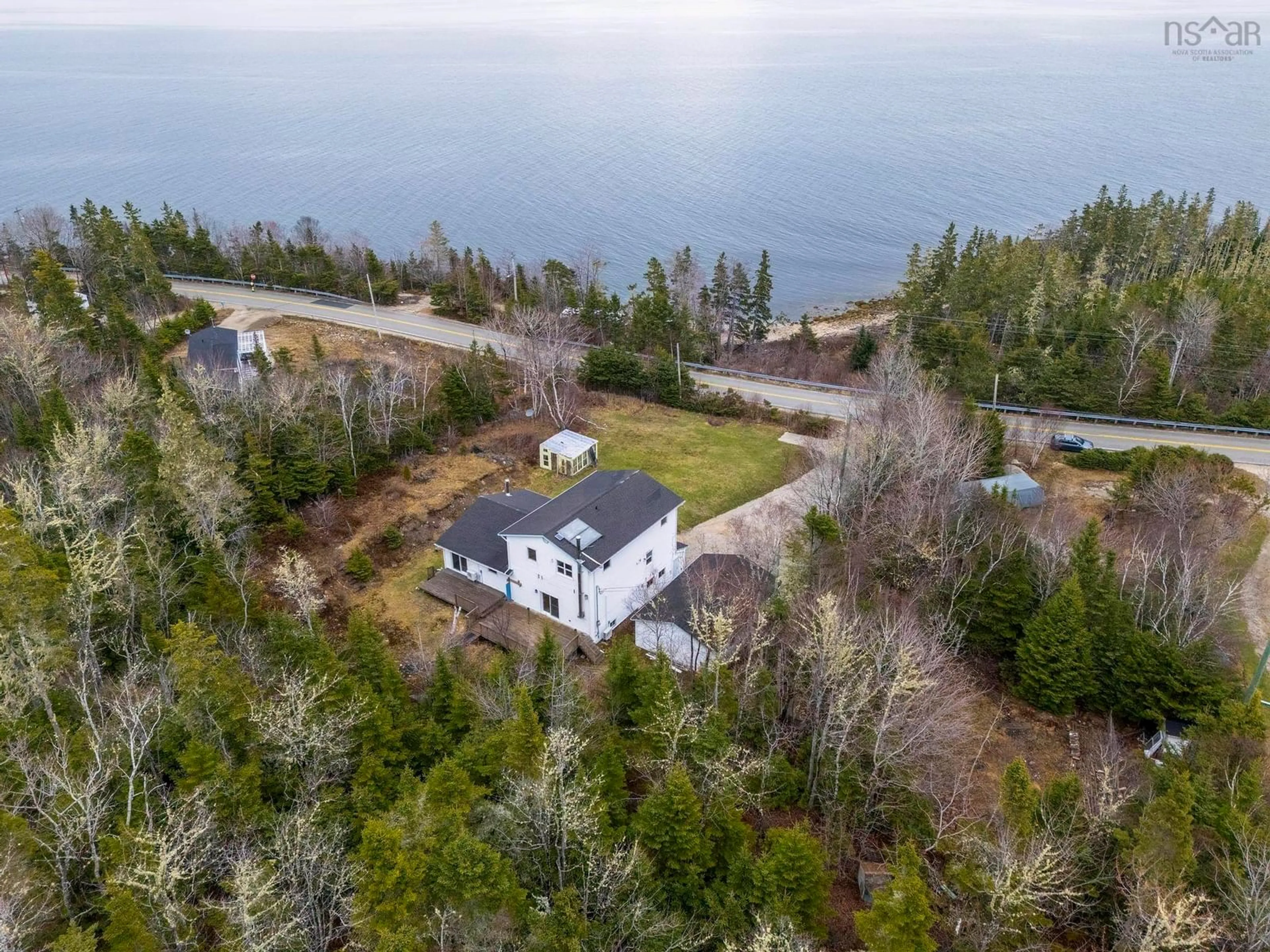A pic from outside/outdoor area/front of a property/back of a property/a pic from drone, water/lake/river/ocean view for 2208 329 Hwy, Birchy Head Nova Scotia B0J 1T0