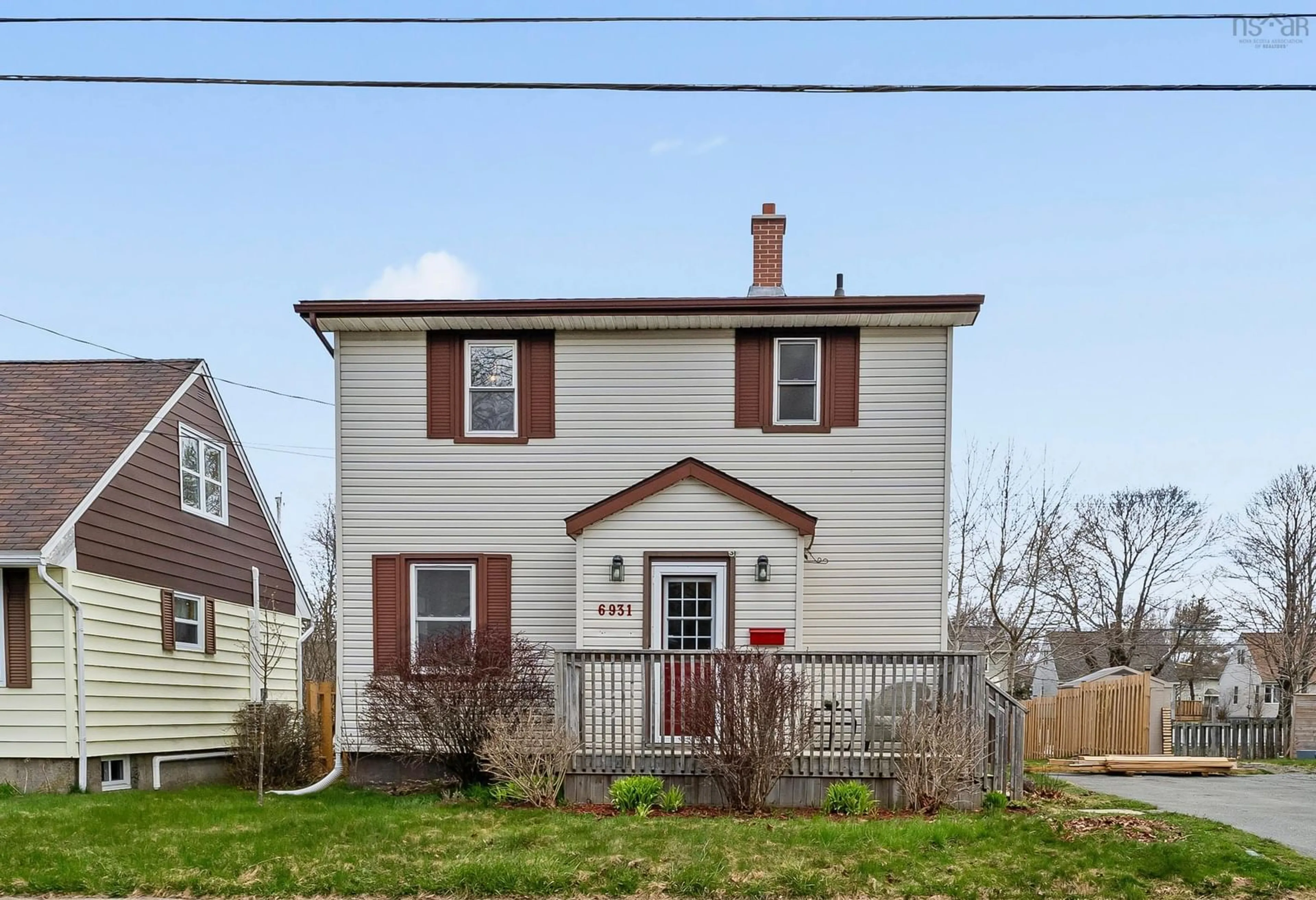 Home with vinyl exterior material, street for 6931 Vaughan Ave, Halifax Nova Scotia B3L 2L9
