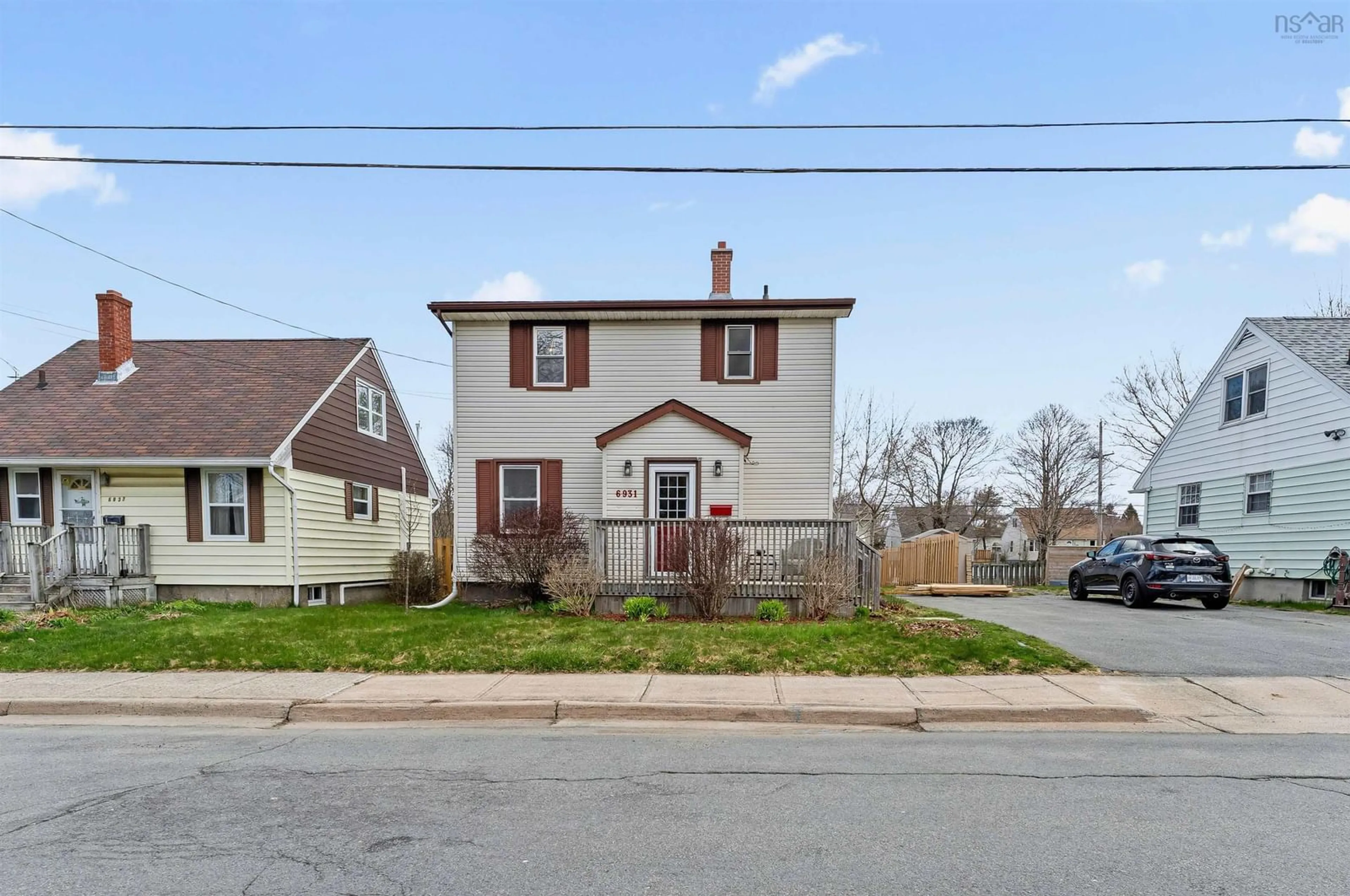 Home with vinyl exterior material, street for 6931 Vaughan Ave, Halifax Nova Scotia B3L 2L9