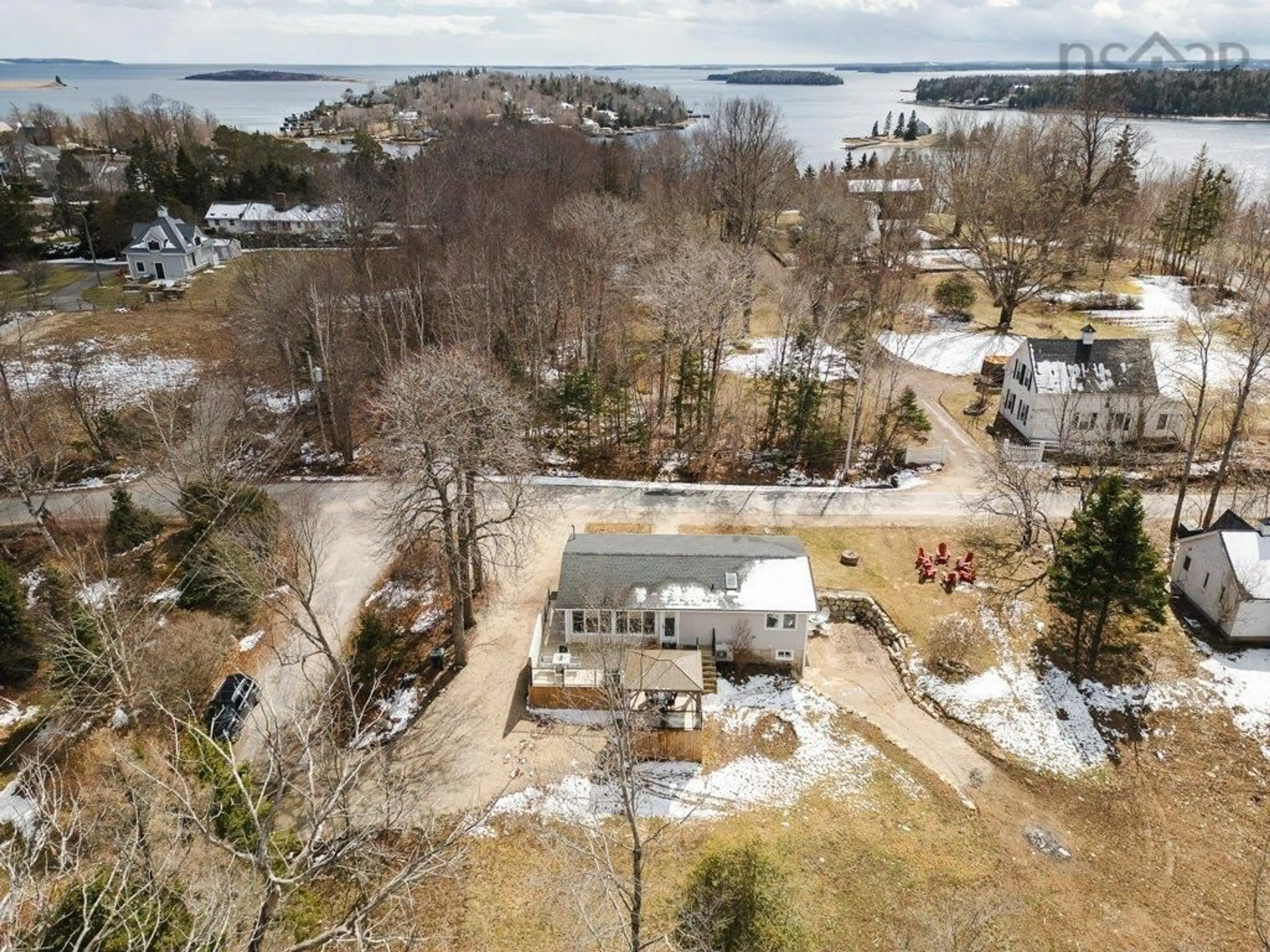 A pic from outside/outdoor area/front of a property/back of a property/a pic from drone, water/lake/river/ocean view for 132 Regent St, Chester Nova Scotia B0J 1J0