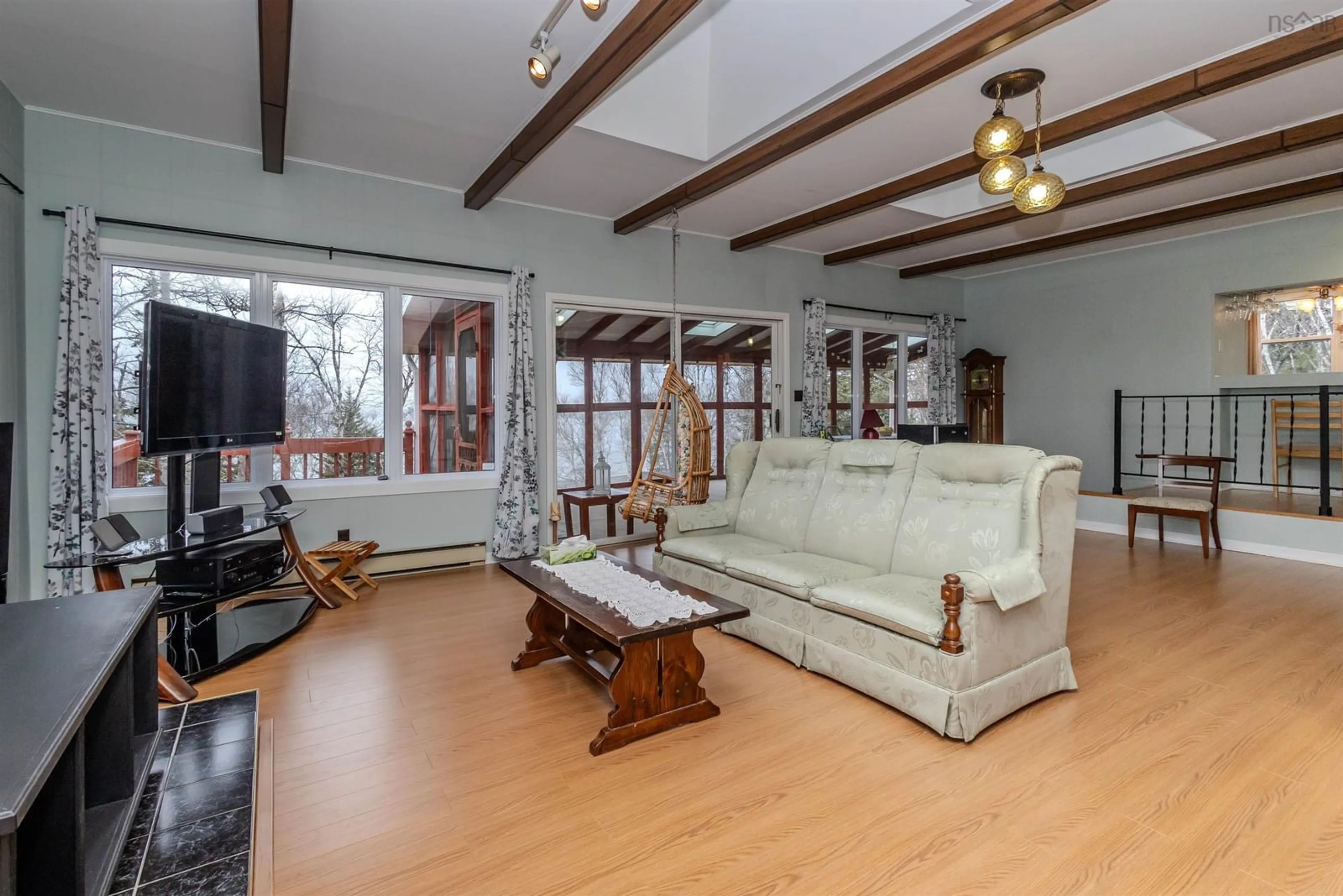 Living room with furniture, wood/laminate floor for 69 Birch Hill Lane, Albert Bridge Nova Scotia B1K 2K8
