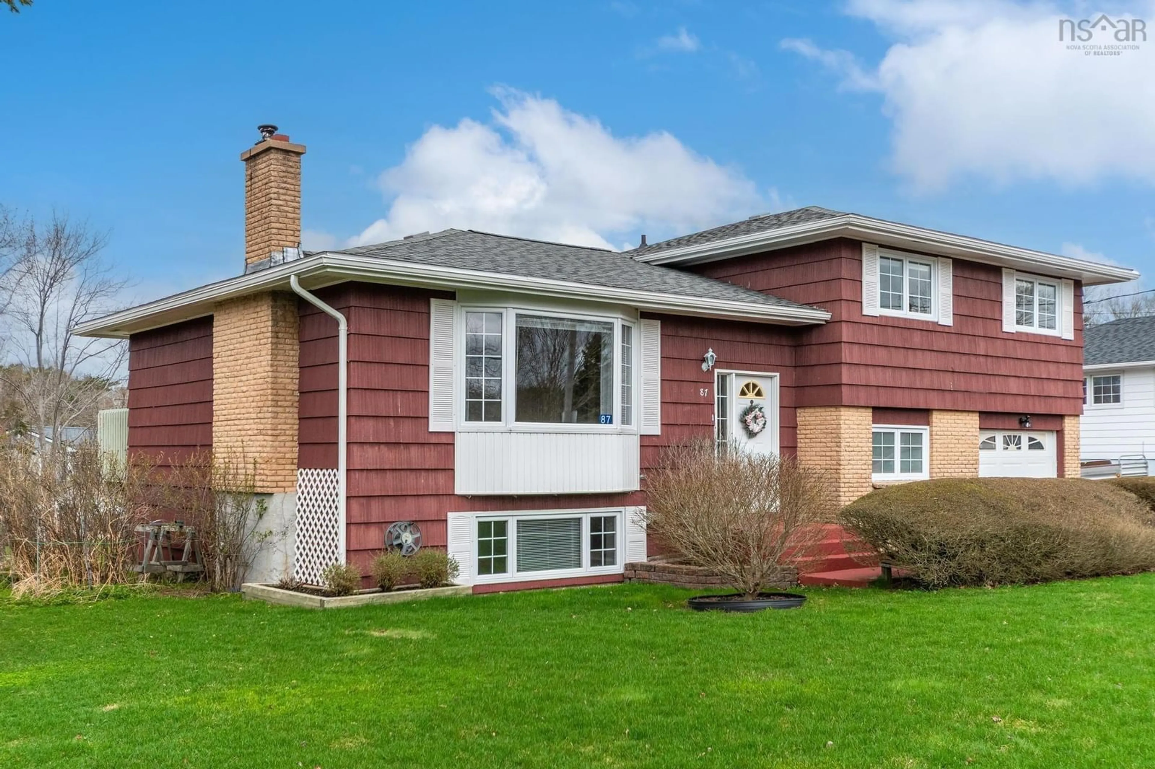 Home with vinyl exterior material, street for 87 Riverwood Dr, Timberlea Nova Scotia B3T 1C7