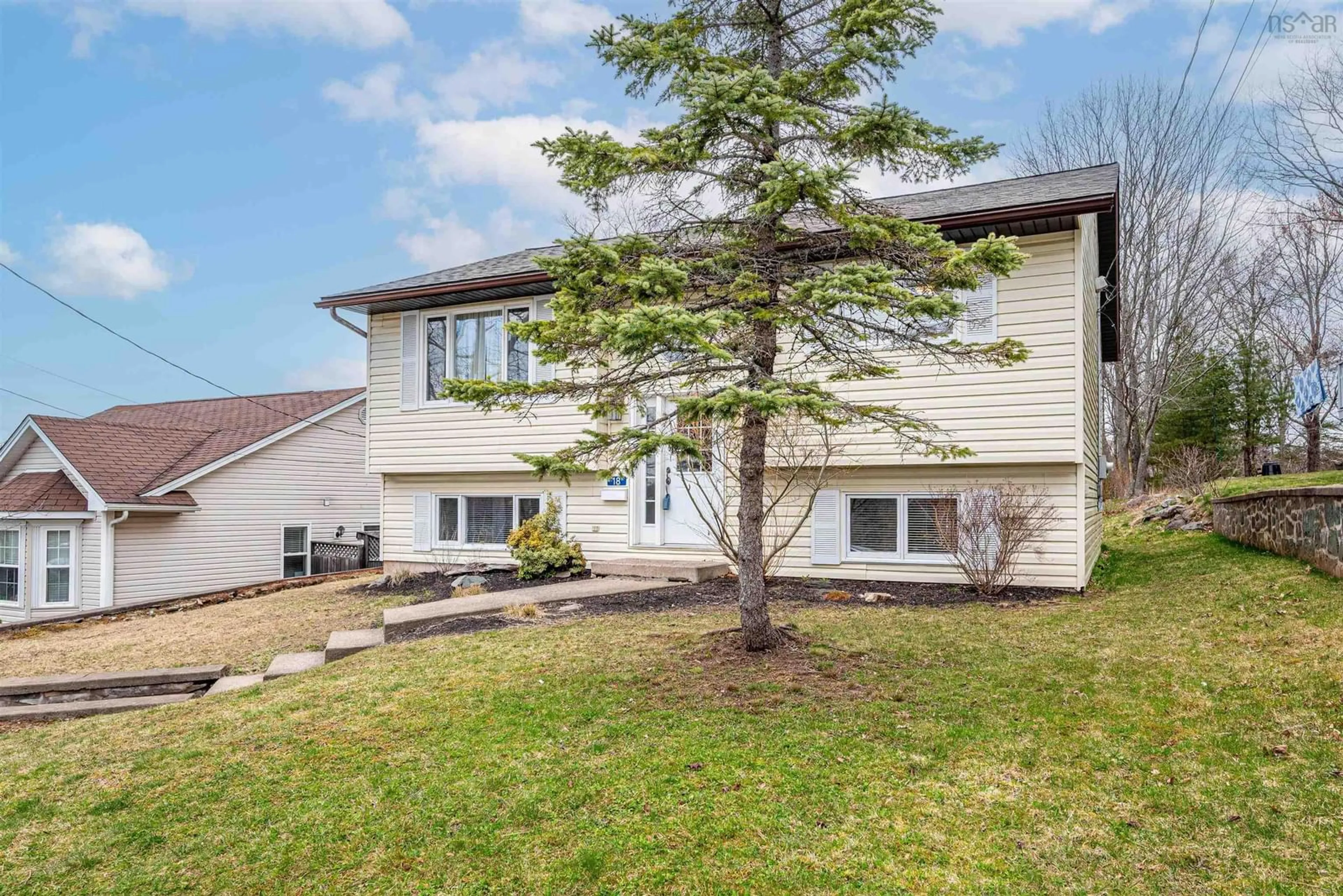 Home with vinyl exterior material, street for 18 Schultz St, Lower Sackville Nova Scotia B4C 1G8