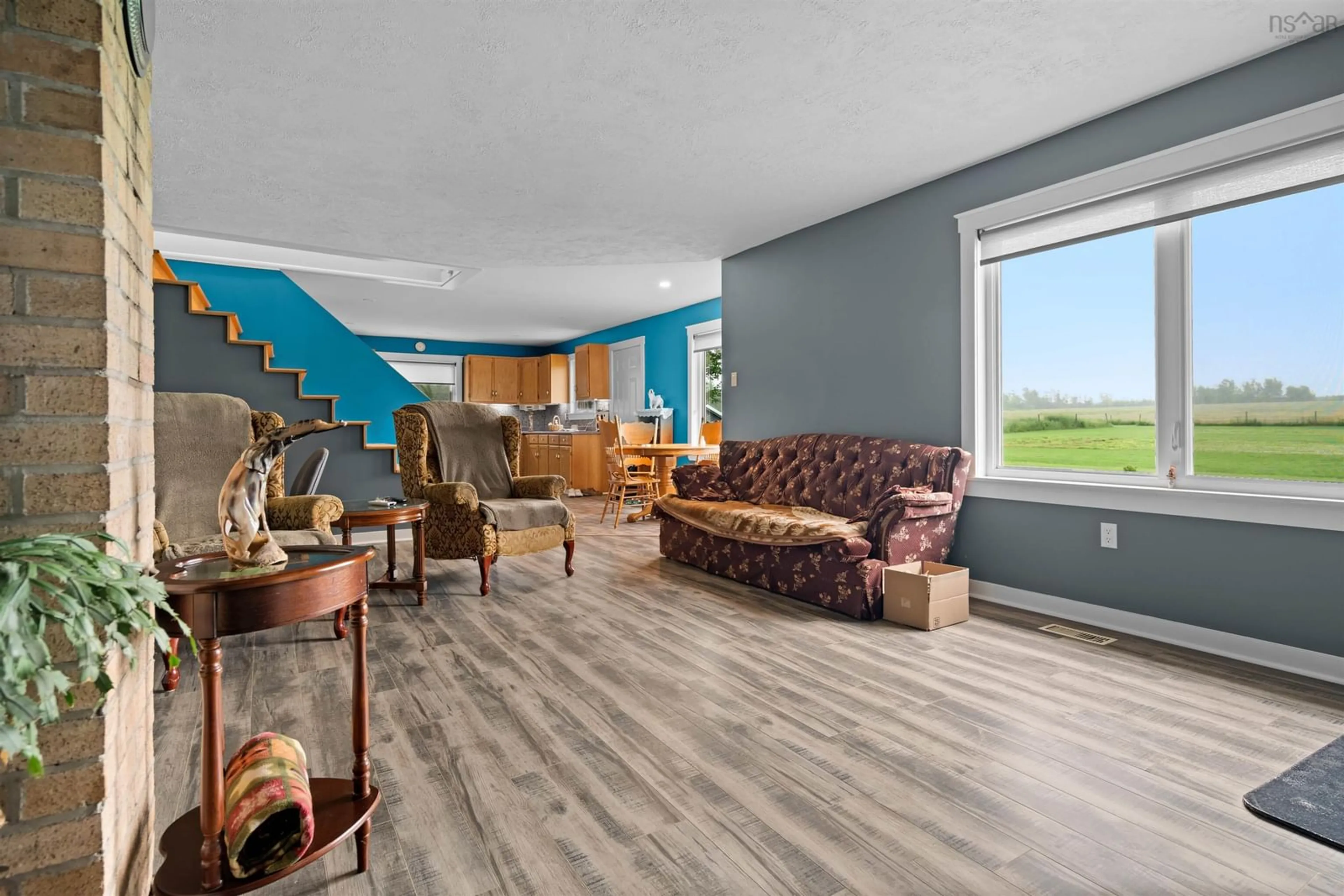 Living room with furniture, wood/laminate floor for 226 Baillies Rd, Bigney Nova Scotia B0K 1N0