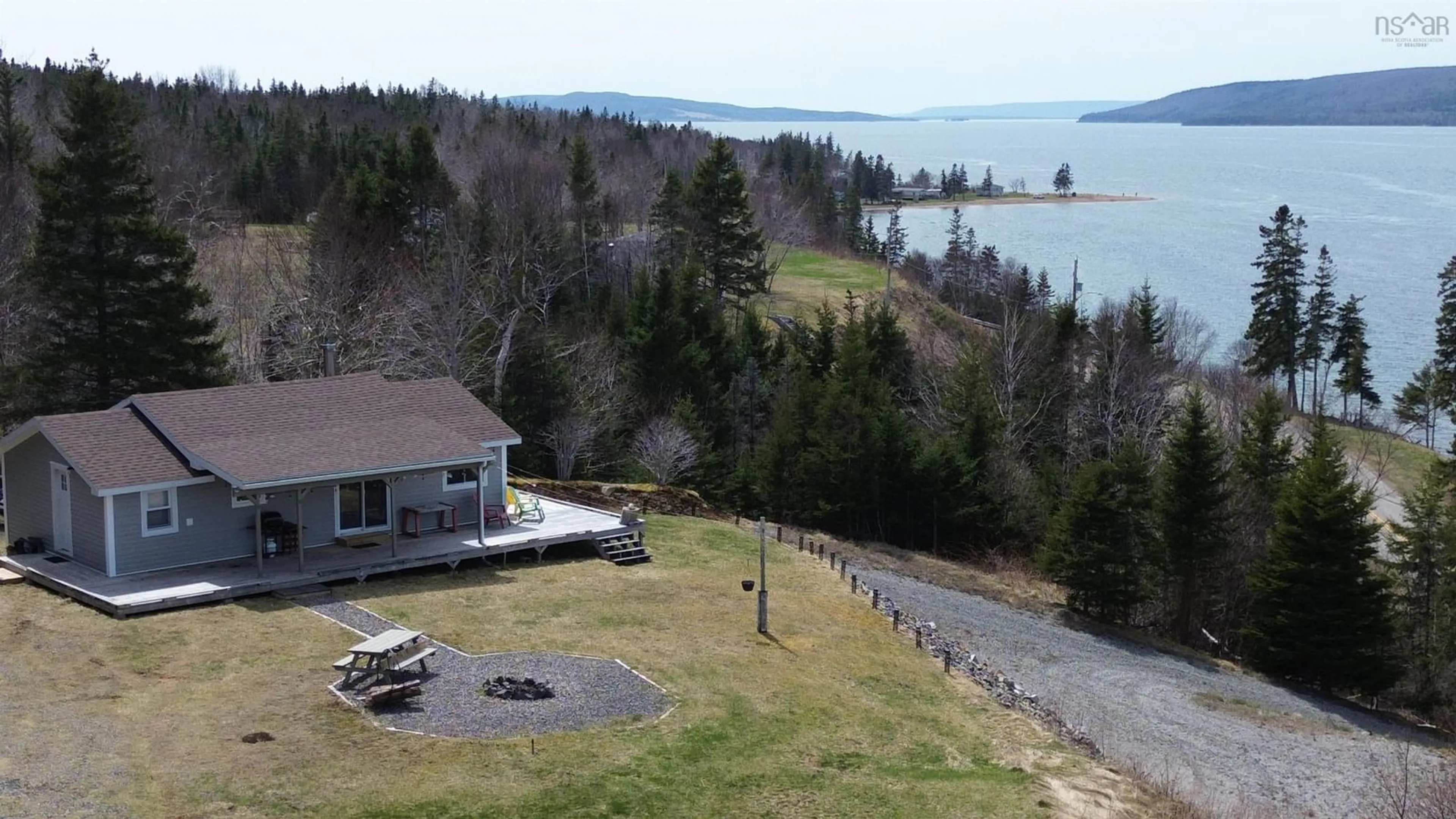 A pic from outside/outdoor area/front of a property/back of a property/a pic from drone, water/lake/river/ocean view for 8972 Kempt Head Rd, Kempt Head Nova Scotia B1X 1R2