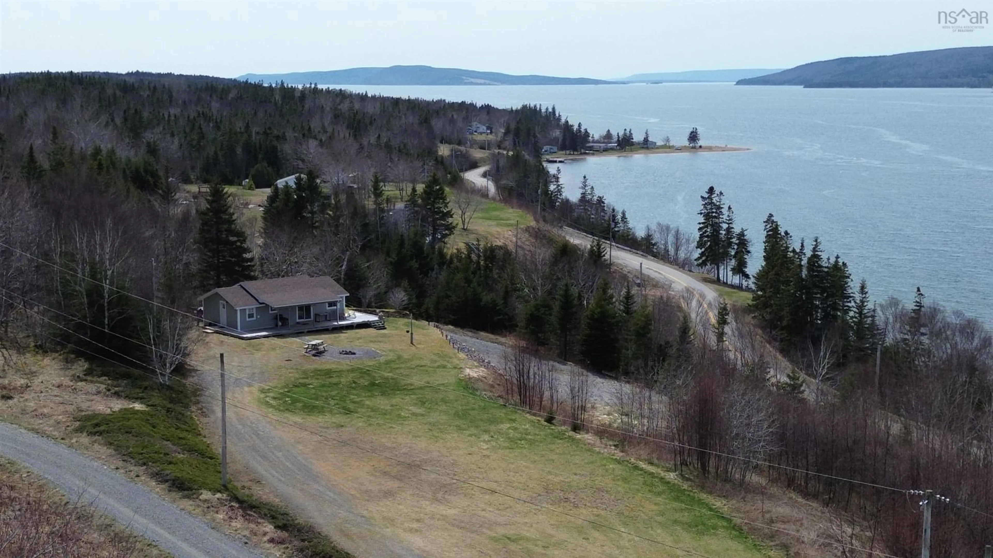 A pic from outside/outdoor area/front of a property/back of a property/a pic from drone, water/lake/river/ocean view for 8972 Kempt Head Rd, Kempt Head Nova Scotia B1X 1R2