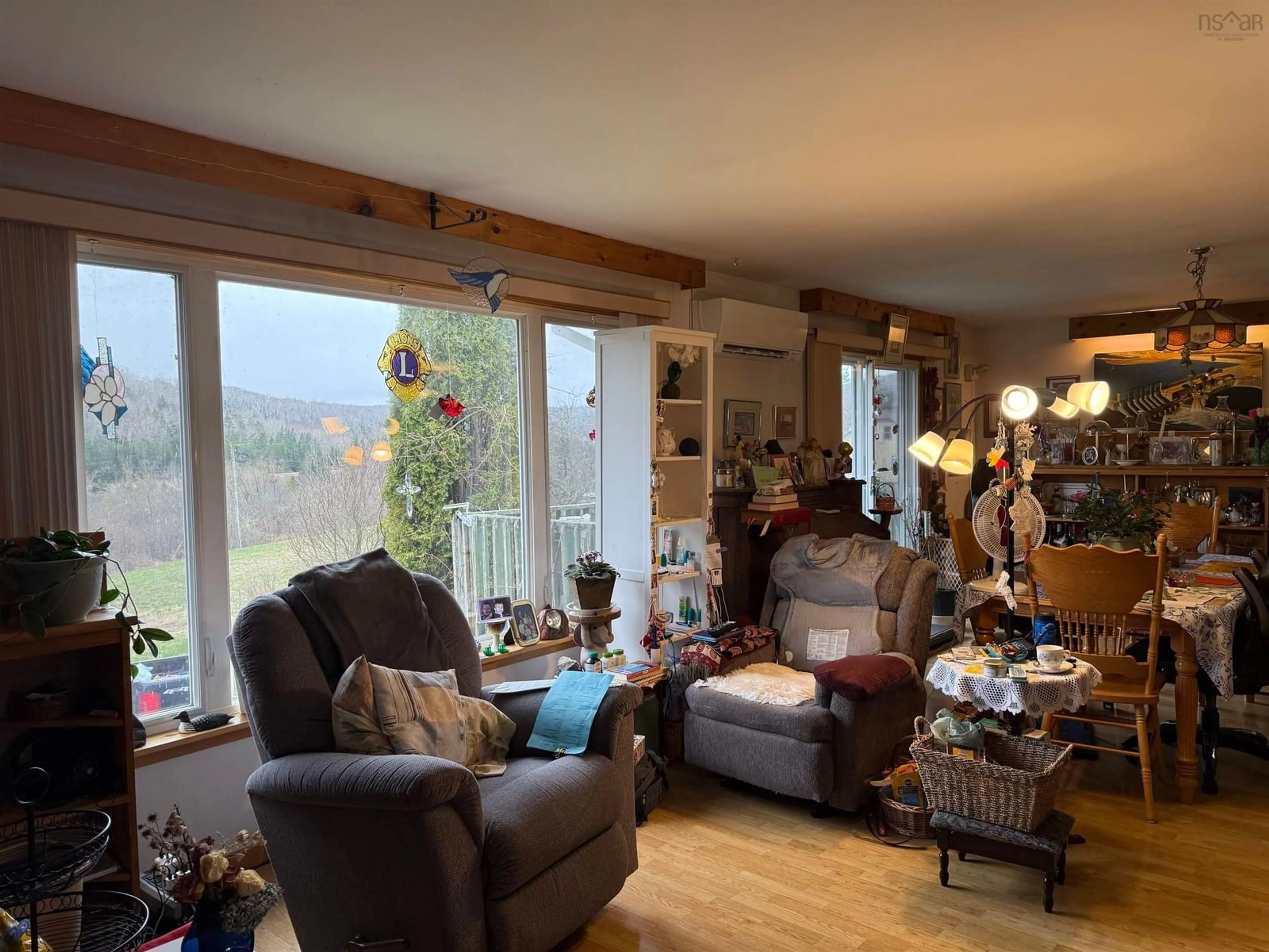 Living room with furniture, wood/laminate floor for 70 John Munroe Rd, Marshy Hope Nova Scotia B2G 2K8