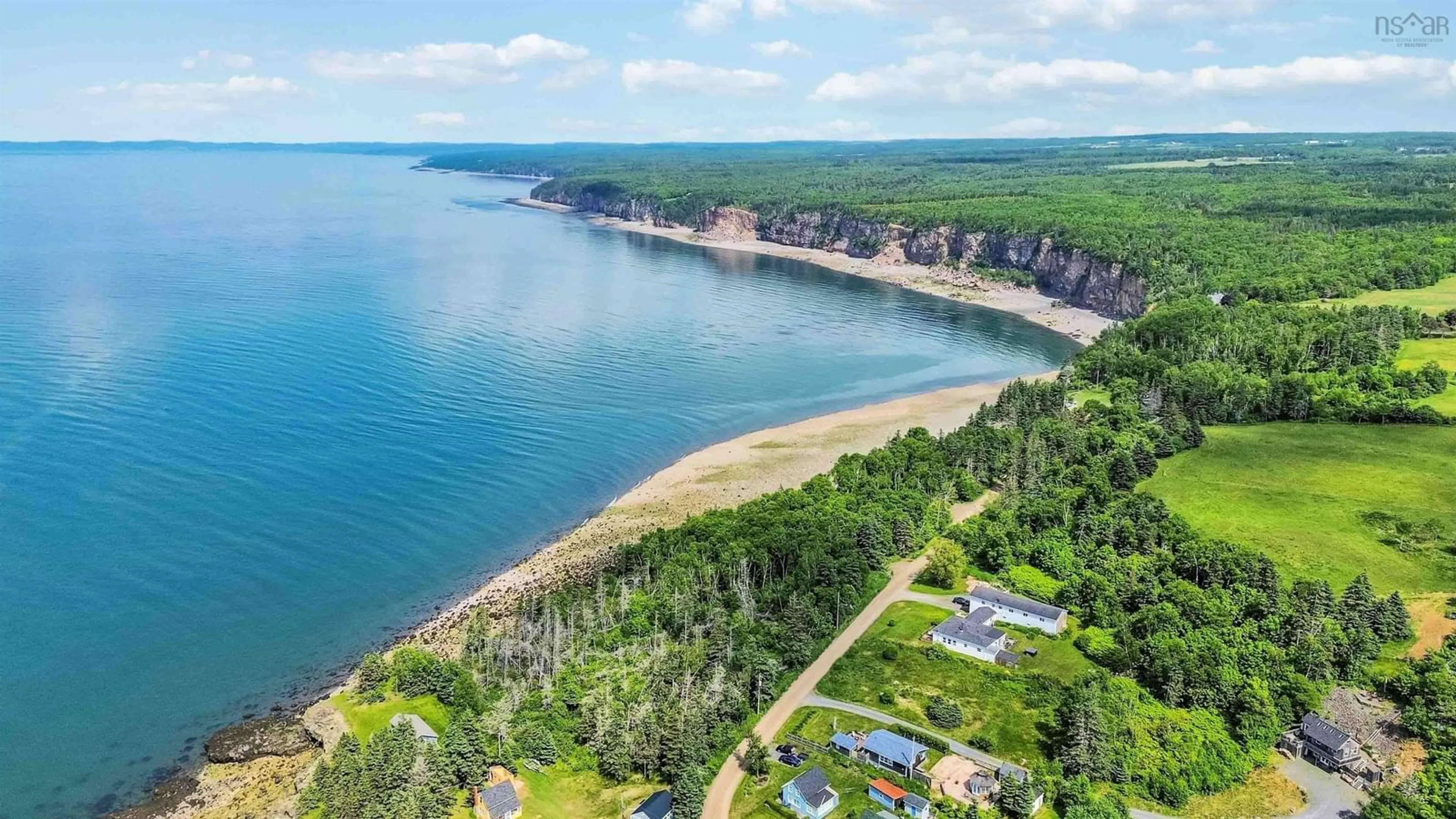 A pic from outside/outdoor area/front of a property/back of a property/a pic from drone, water/lake/river/ocean view for 54 Cove Rd, Halls Harbour Nova Scotia B0P 1J0