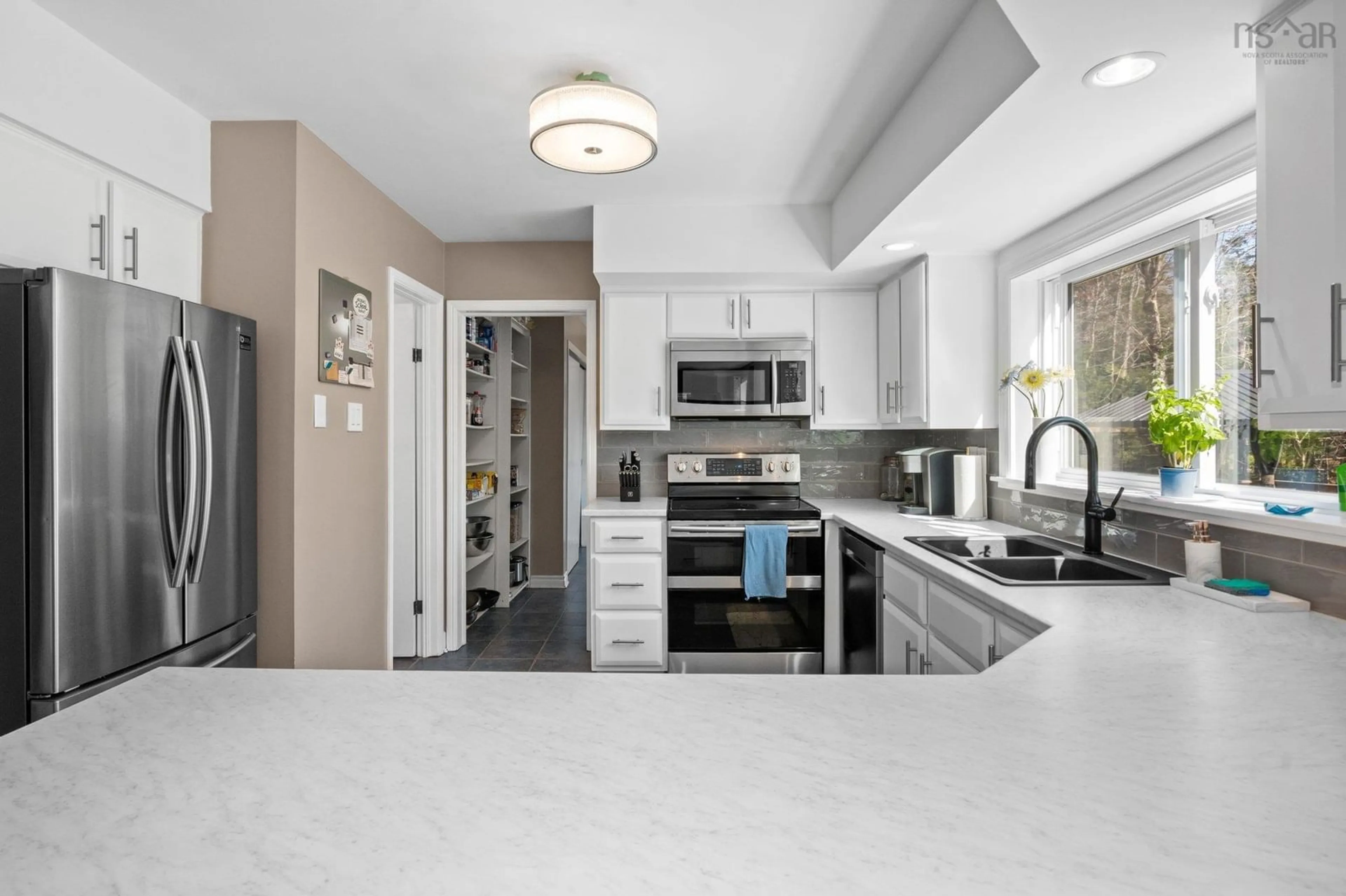 Open concept kitchen, ceramic/tile floor for 70 Carlheath Dr, Wellington Nova Scotia B2T 1J4