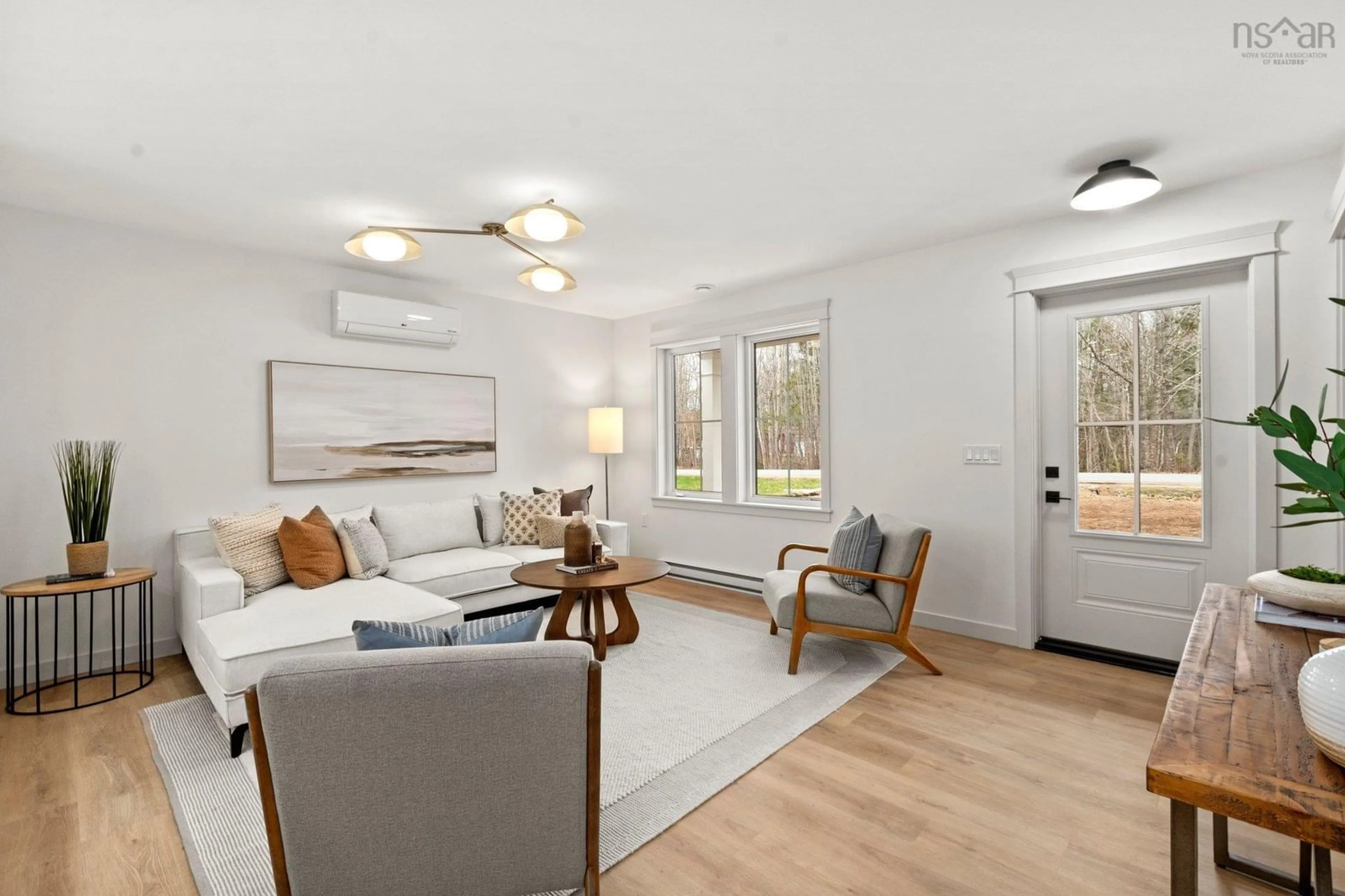 Living room with furniture, wood/laminate floor for 32 Pleasant St, Wilmot Nova Scotia B0P 1W0