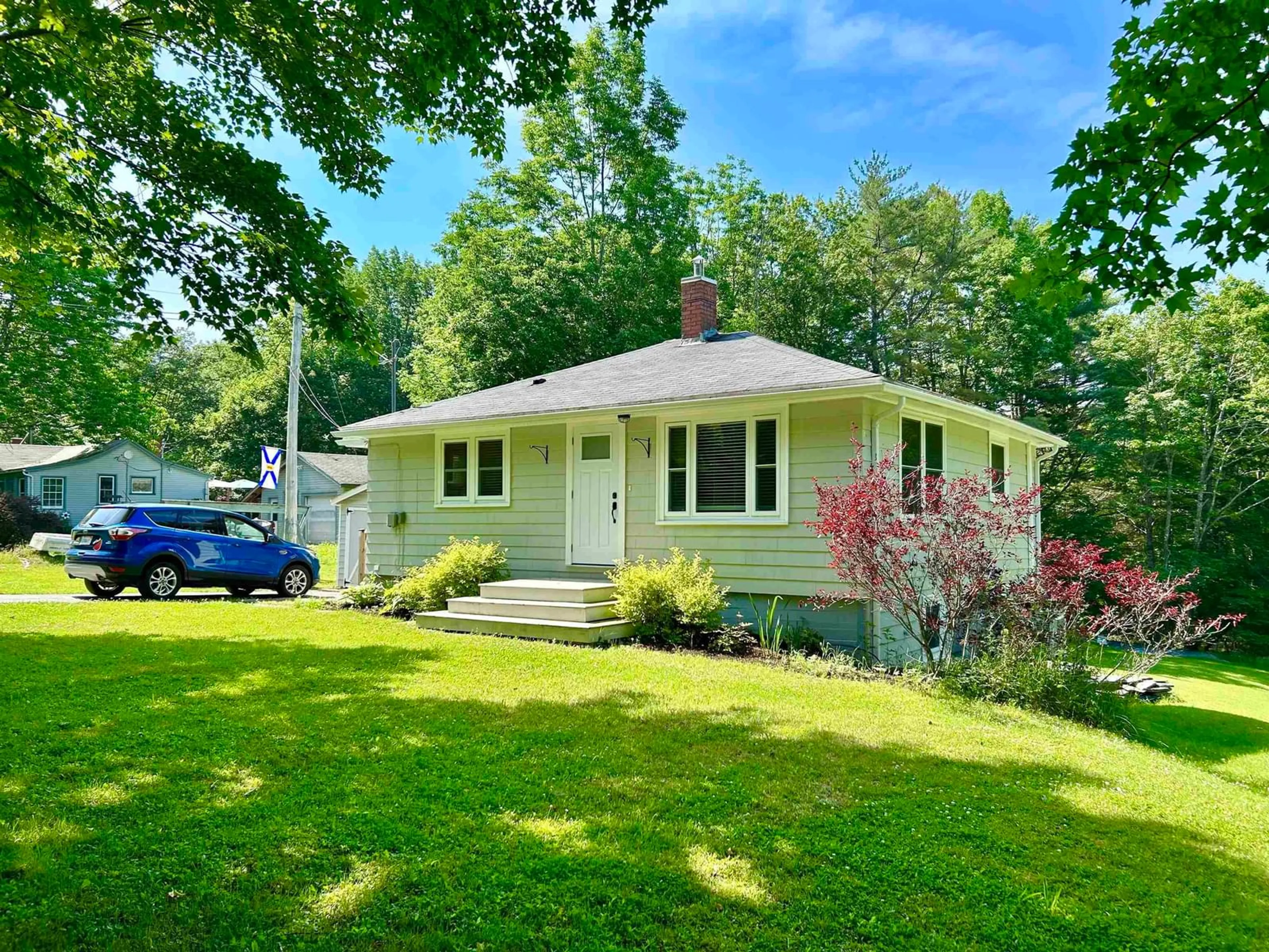 Home with vinyl exterior material, street for 379 Highway 325, Blockhouse Nova Scotia B0J 1E0