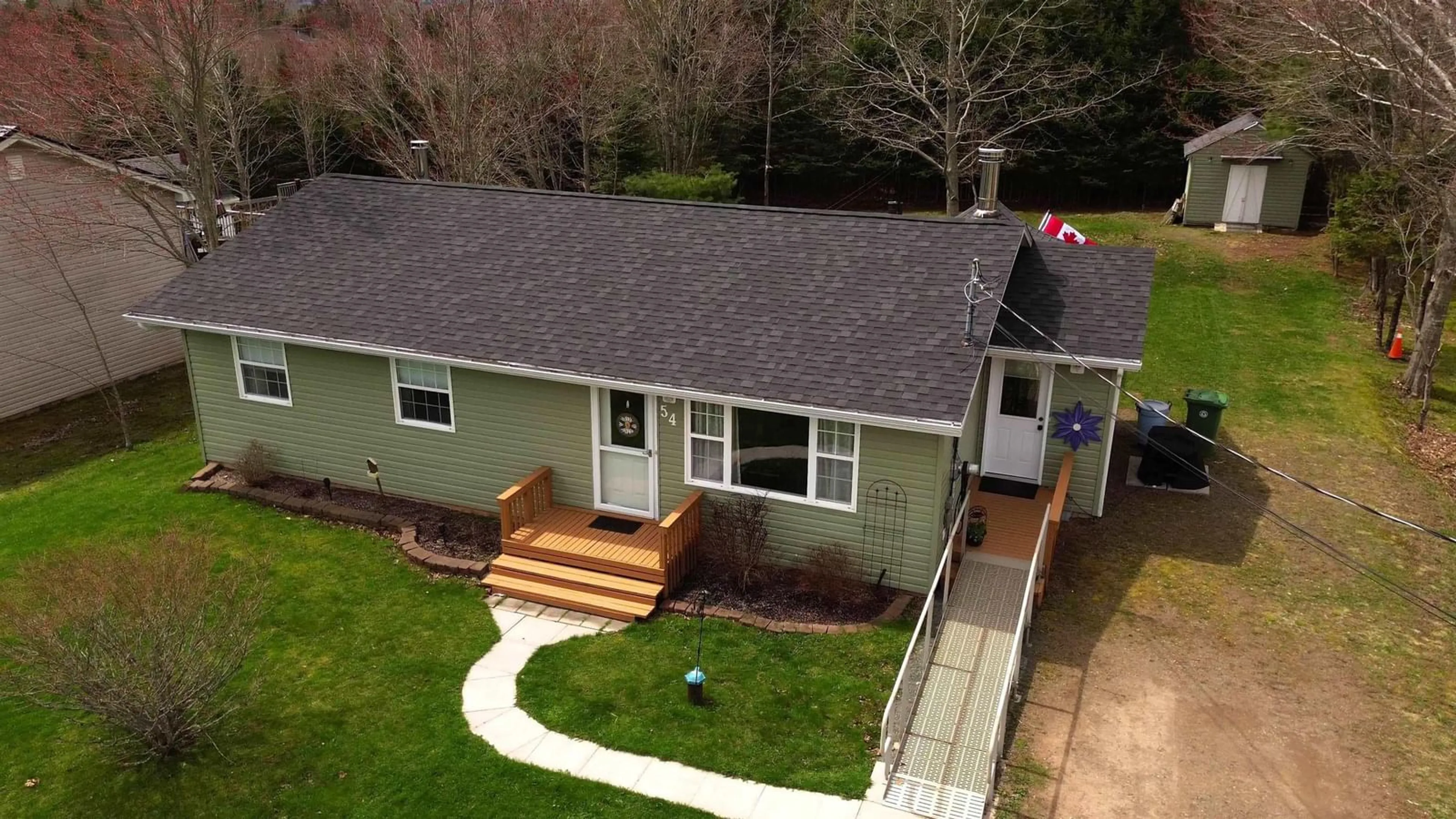 A pic from outside/outdoor area/front of a property/back of a property/a pic from drone, unknown for 54 Burris Dr, Valley Nova Scotia B6L 3B6