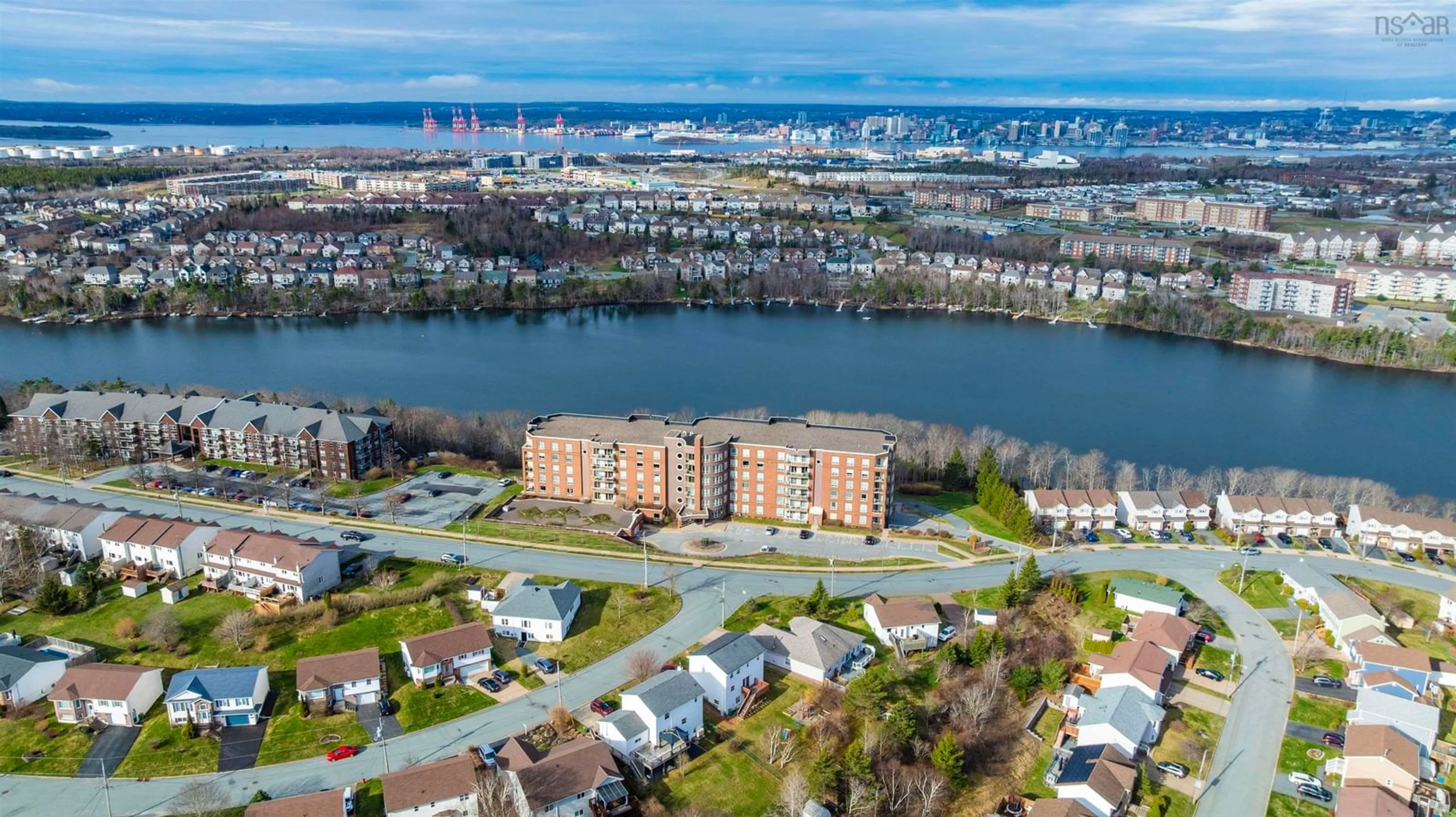 A pic from outside/outdoor area/front of a property/back of a property/a pic from drone, water/lake/river/ocean view for 77 Russell Lake Dr #105, Dartmouth Nova Scotia B2W 6R8