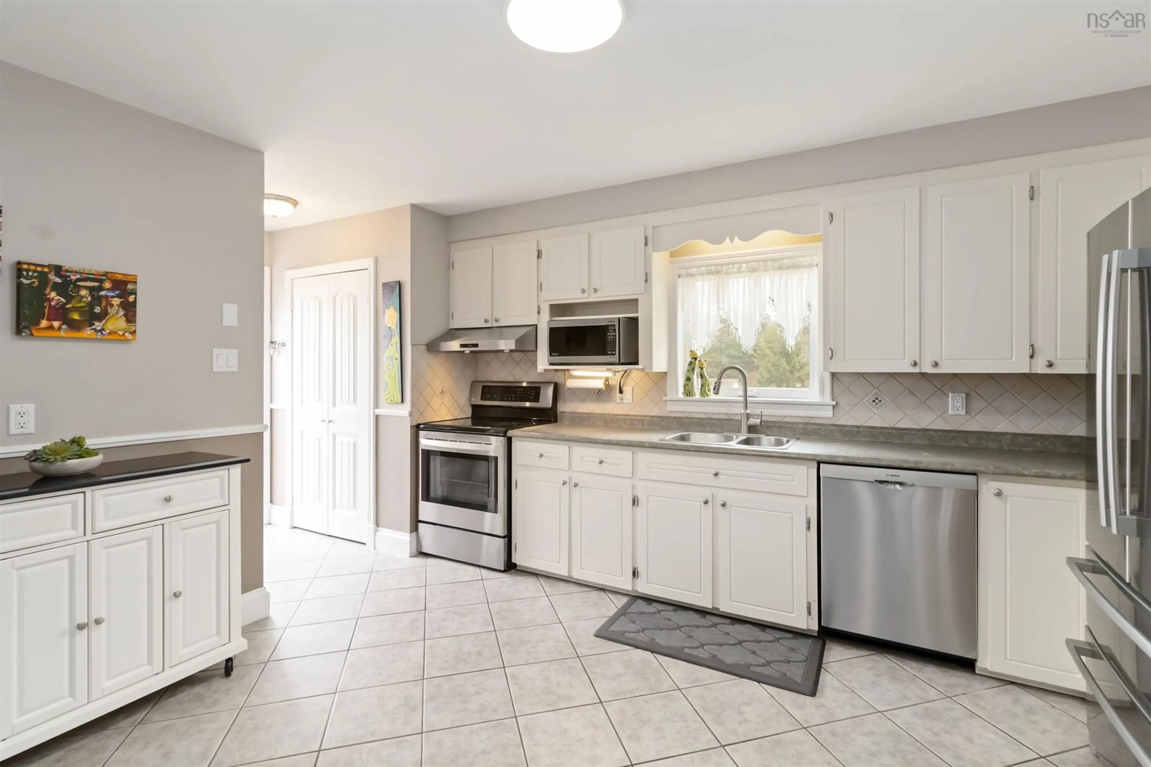 Open concept kitchen, ceramic/tile floor for 77 Wildwood Blvd, Dartmouth Nova Scotia B2W 2L9