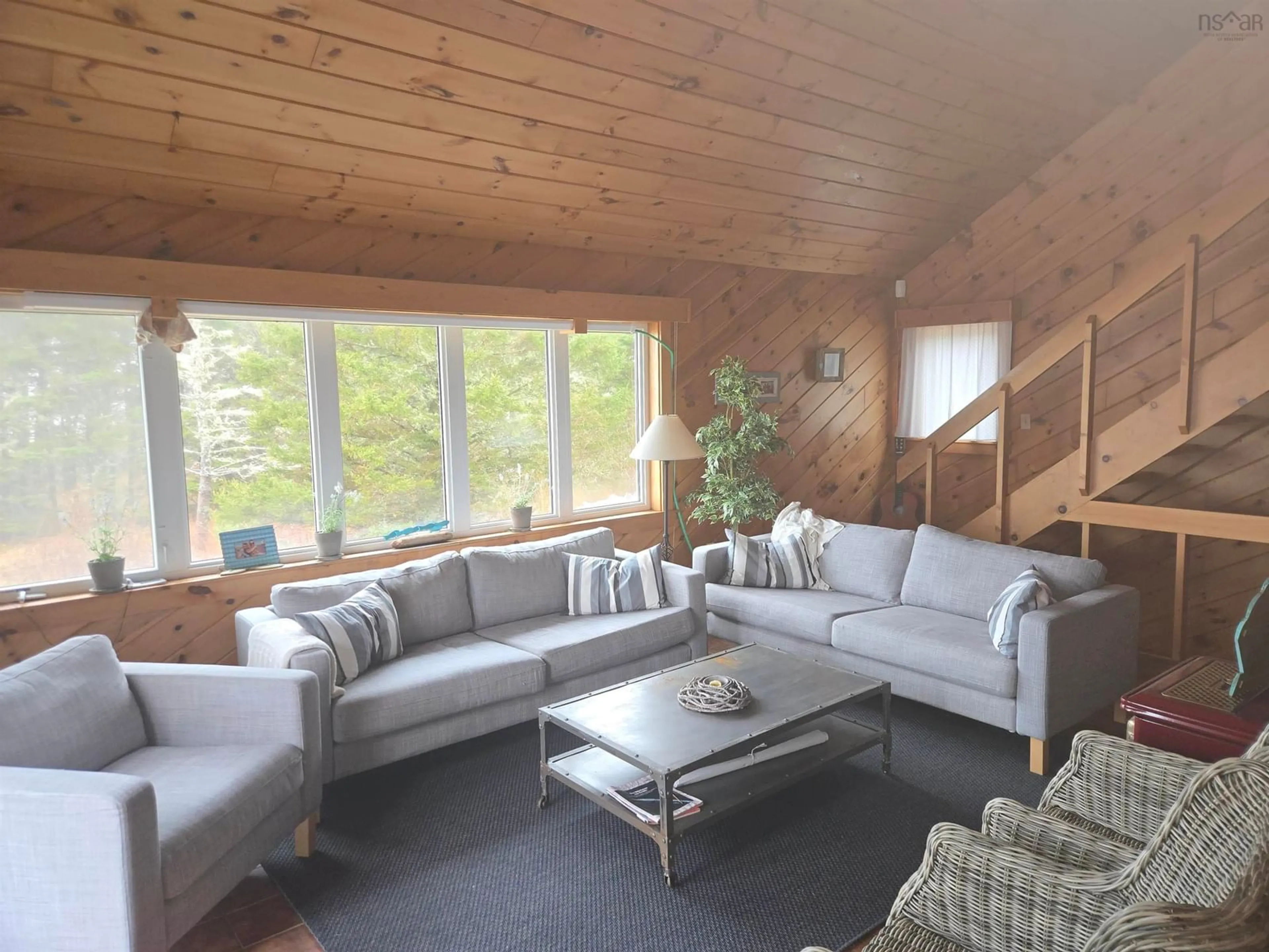 Living room with furniture, wood/laminate floor for 125 Mozier Rd, Sober Island Nova Scotia B0J 3B0