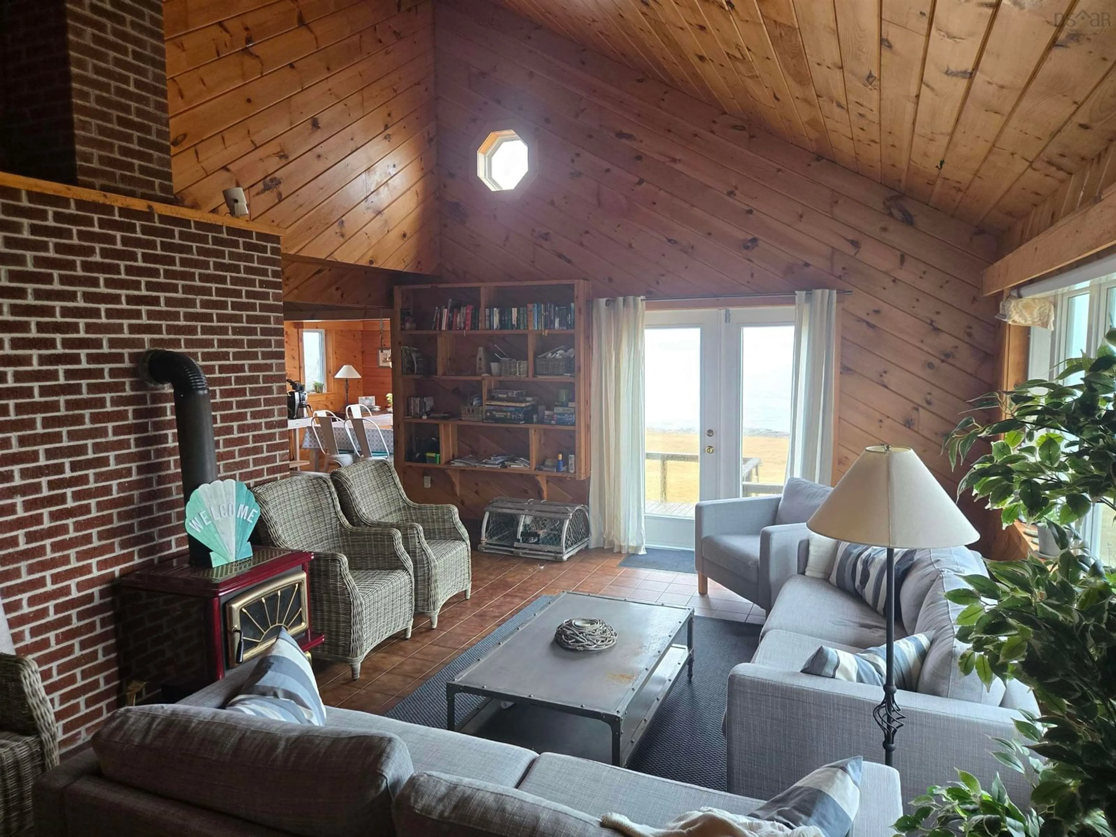 Living room with furniture, wood/laminate floor for 125 Mozier Rd, Sober Island Nova Scotia B0J 3B0