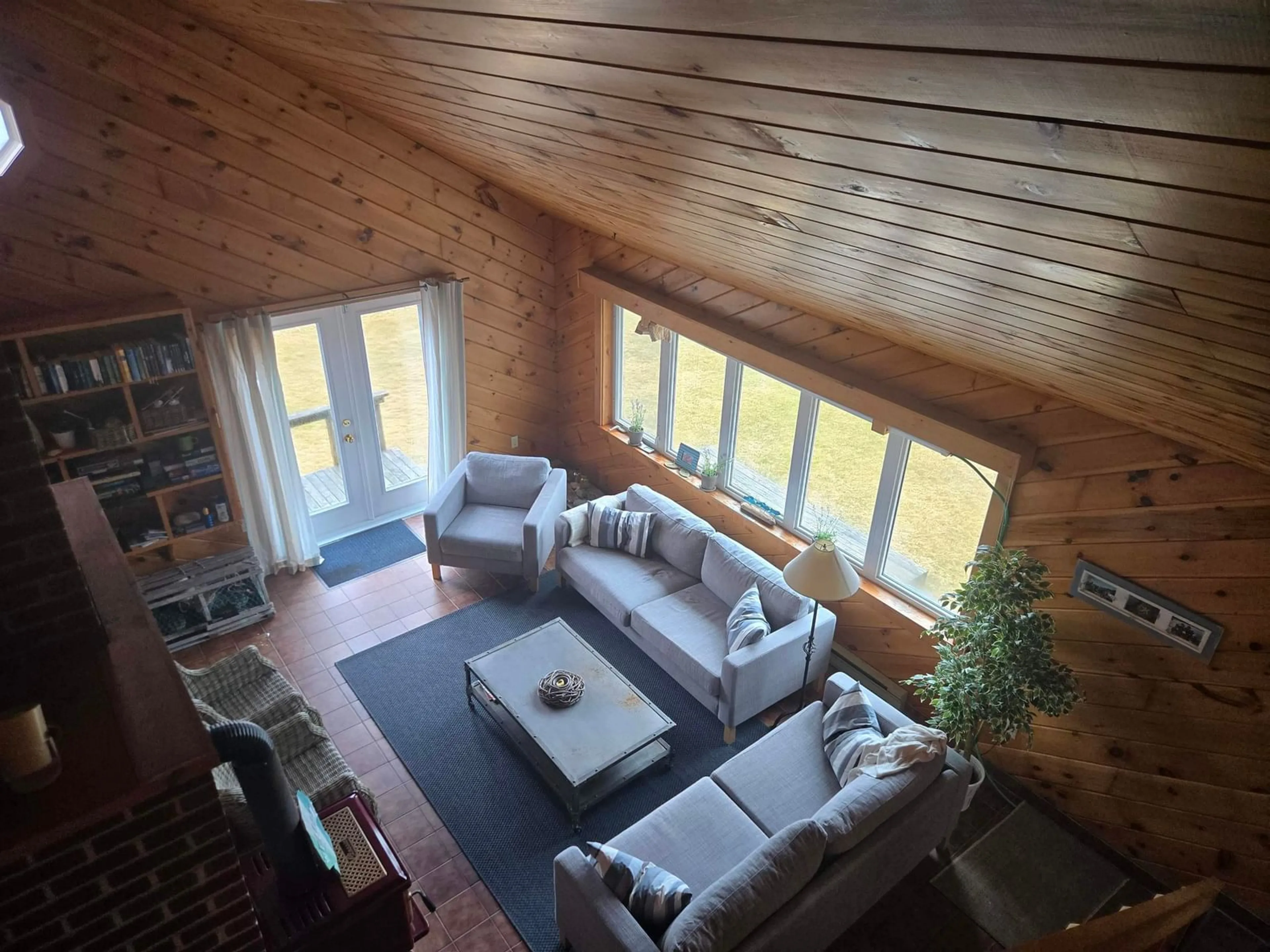 Living room with furniture, wood/laminate floor for 125 Mozier Rd, Sober Island Nova Scotia B0J 3B0