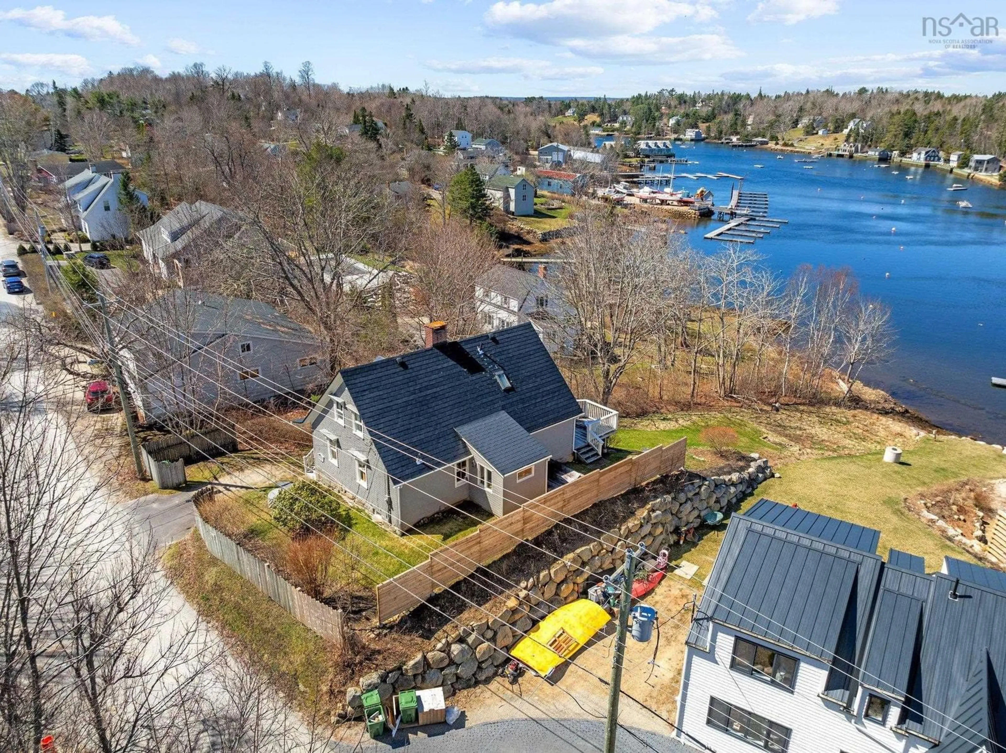 A pic from outside/outdoor area/front of a property/back of a property/a pic from drone, water/lake/river/ocean view for 215 Victoria St, Chester Nova Scotia B0J 1J0
