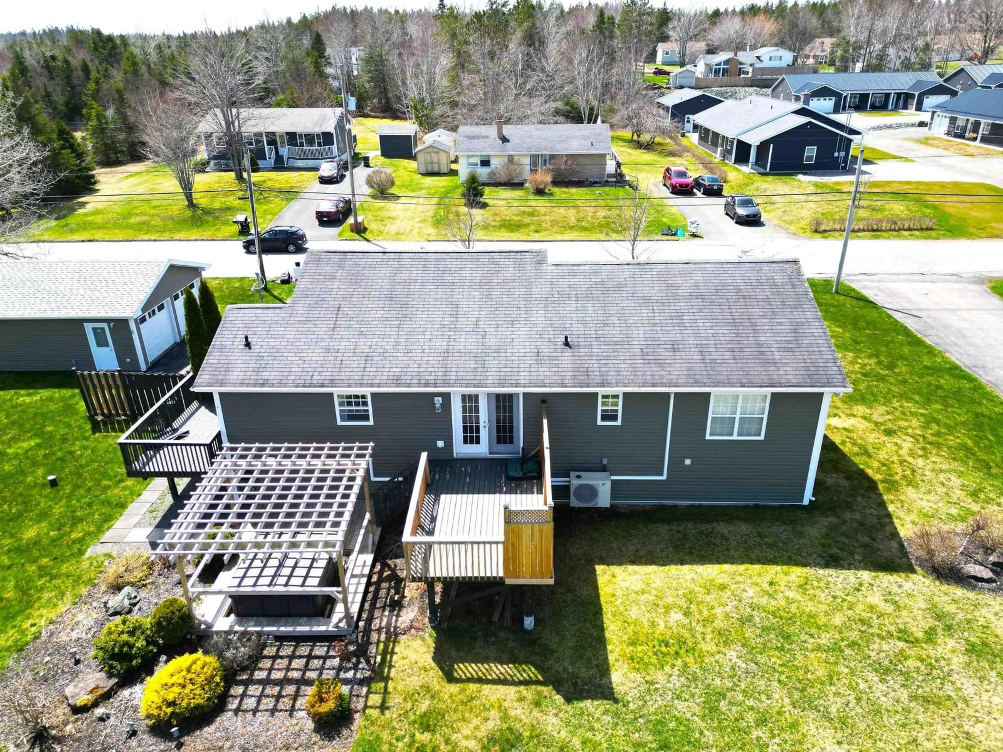 A pic from outside/outdoor area/front of a property/back of a property/a pic from drone, unknown for 179 Woodlawn Dr, Sydney River Nova Scotia B1S 1J1