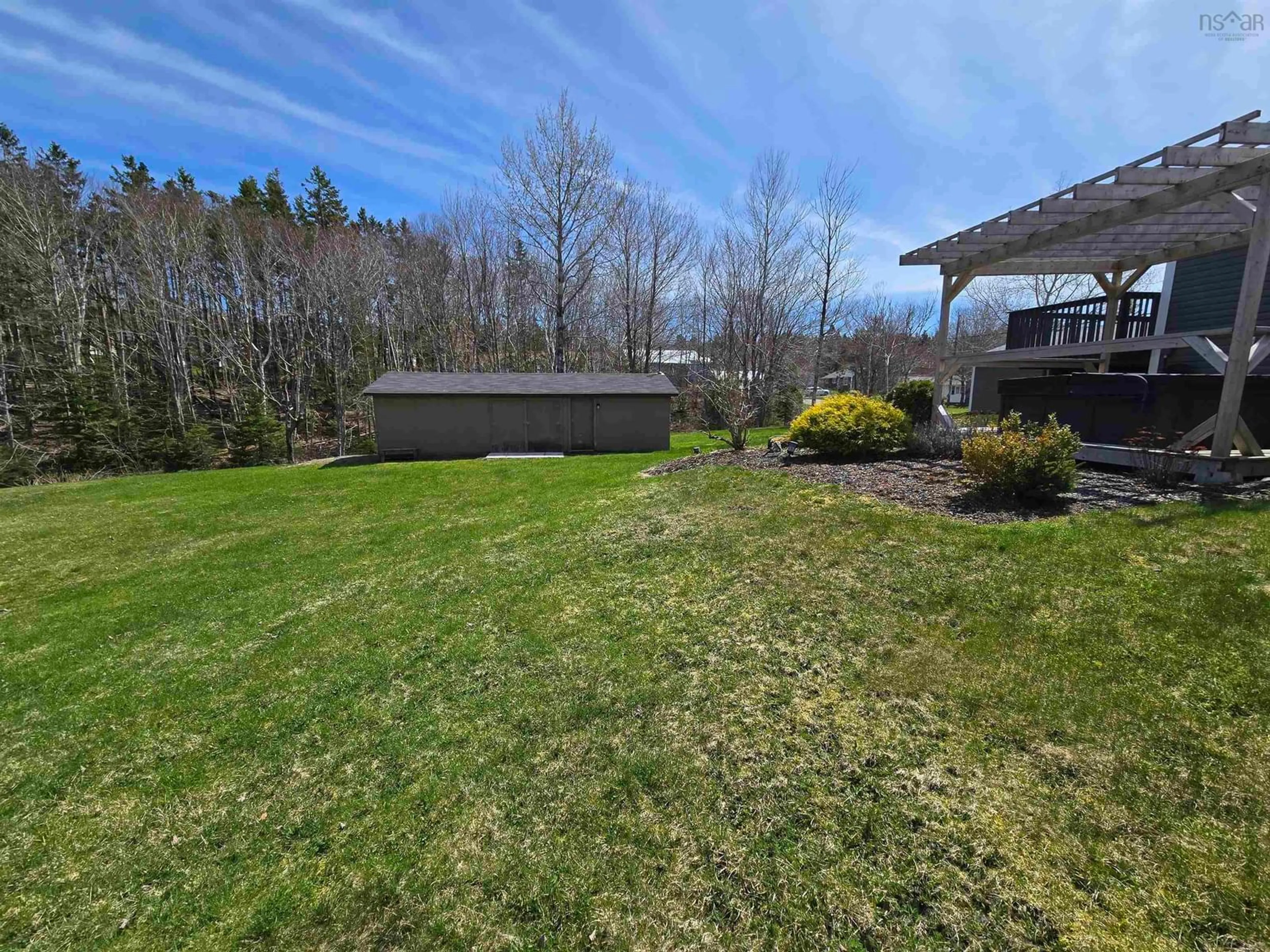 A pic from outside/outdoor area/front of a property/back of a property/a pic from drone, water/lake/river/ocean view for 179 Woodlawn Dr, Sydney River Nova Scotia B1S 1J1