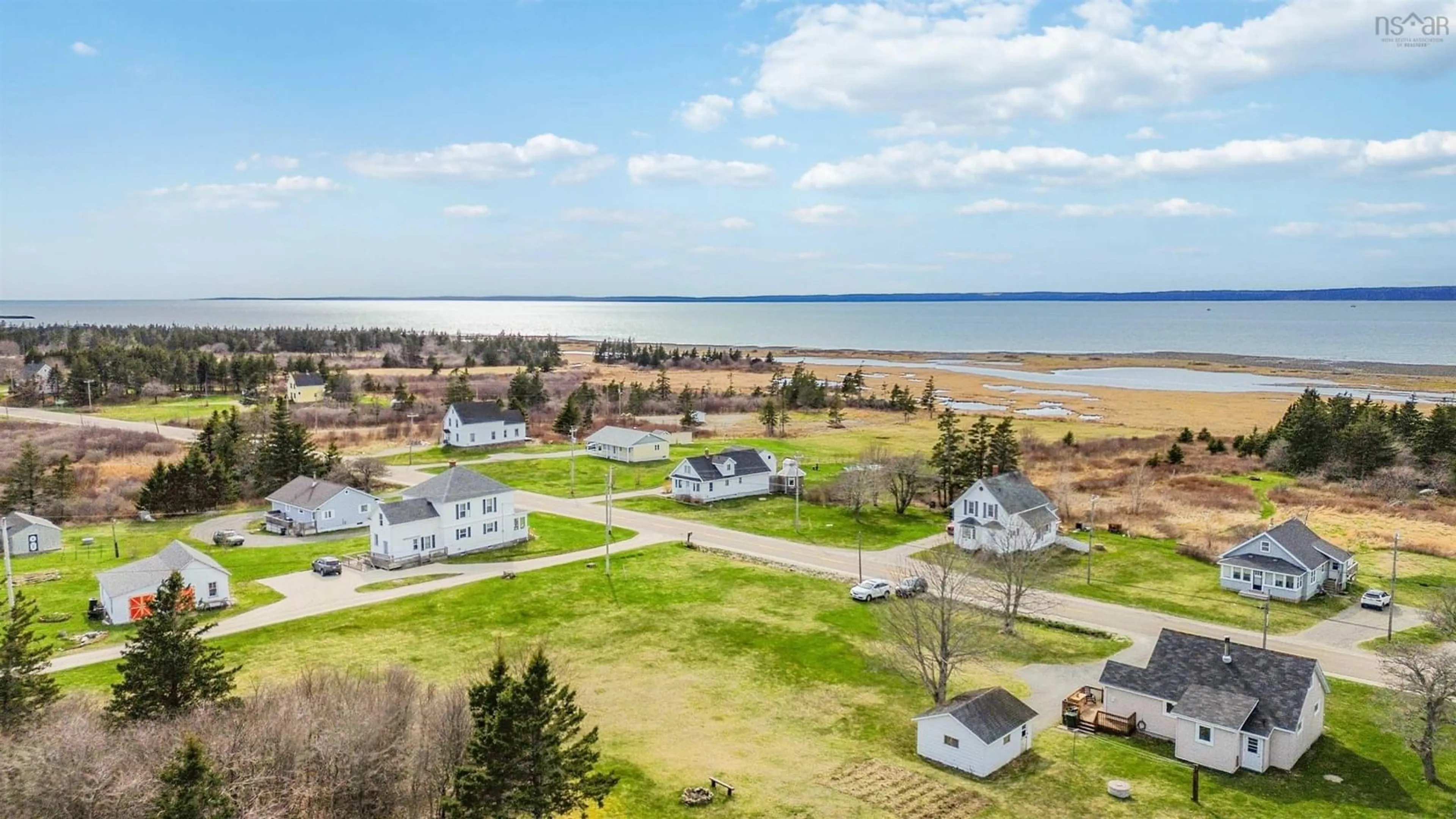 A pic from outside/outdoor area/front of a property/back of a property/a pic from drone, water/lake/river/ocean view for 2372 Highway 1, Grosses Coques Nova Scotia B0W 1M0