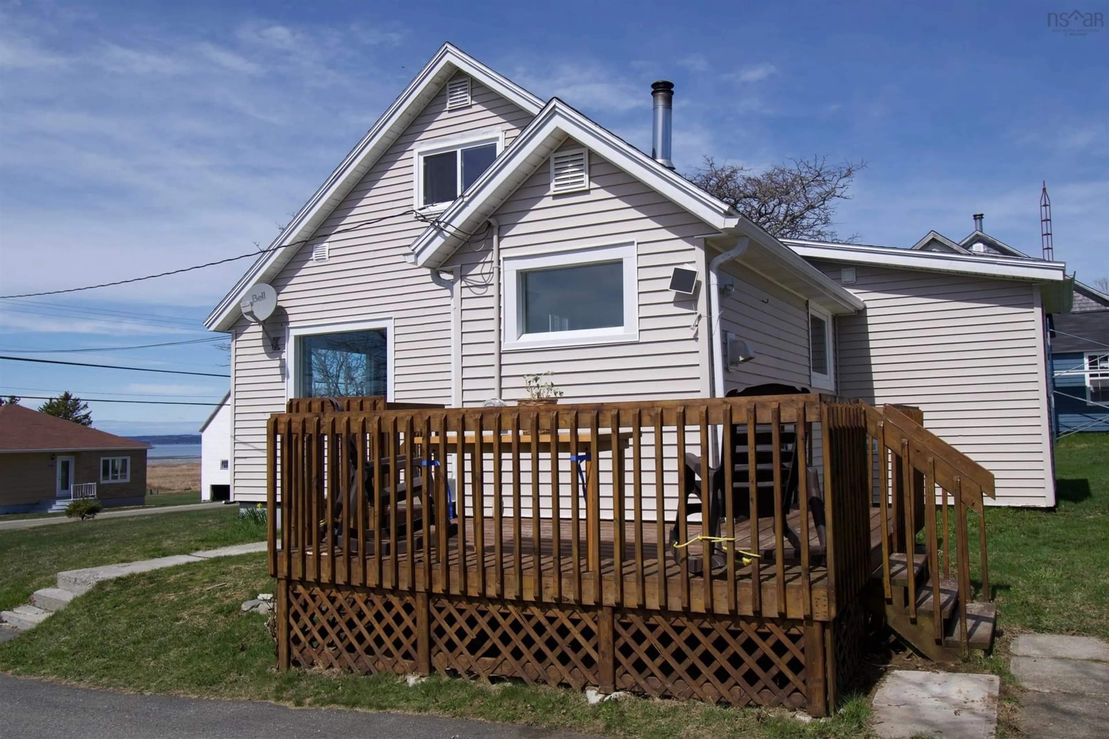 Home with vinyl exterior material, street for 2372 Highway 1, Grosses Coques Nova Scotia B0W 1M0