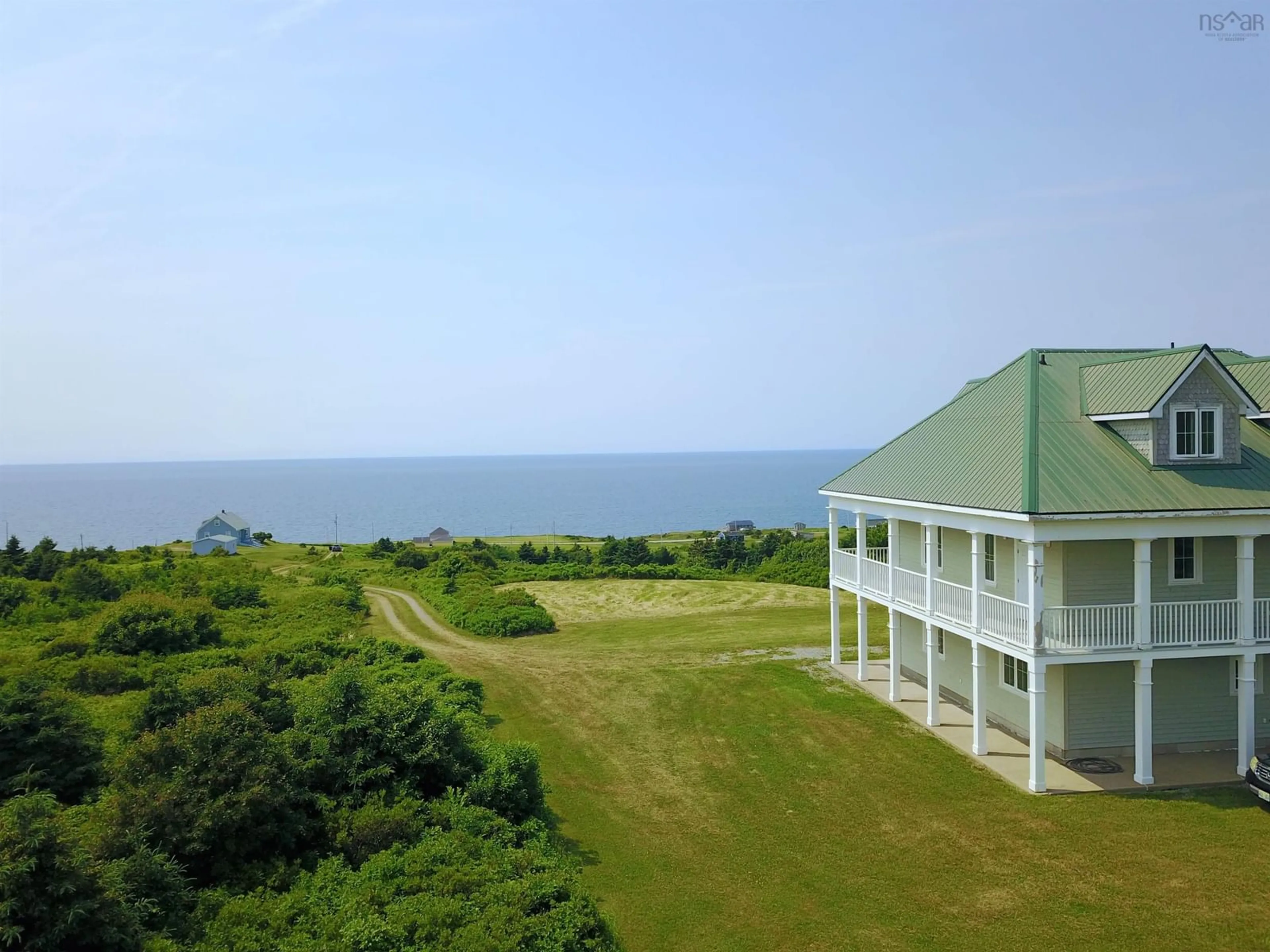 A pic from outside/outdoor area/front of a property/back of a property/a pic from drone, water/lake/river/ocean view for 81 Aucoin Doucet Rd, Cap Le Moine Nova Scotia B0E 3A0