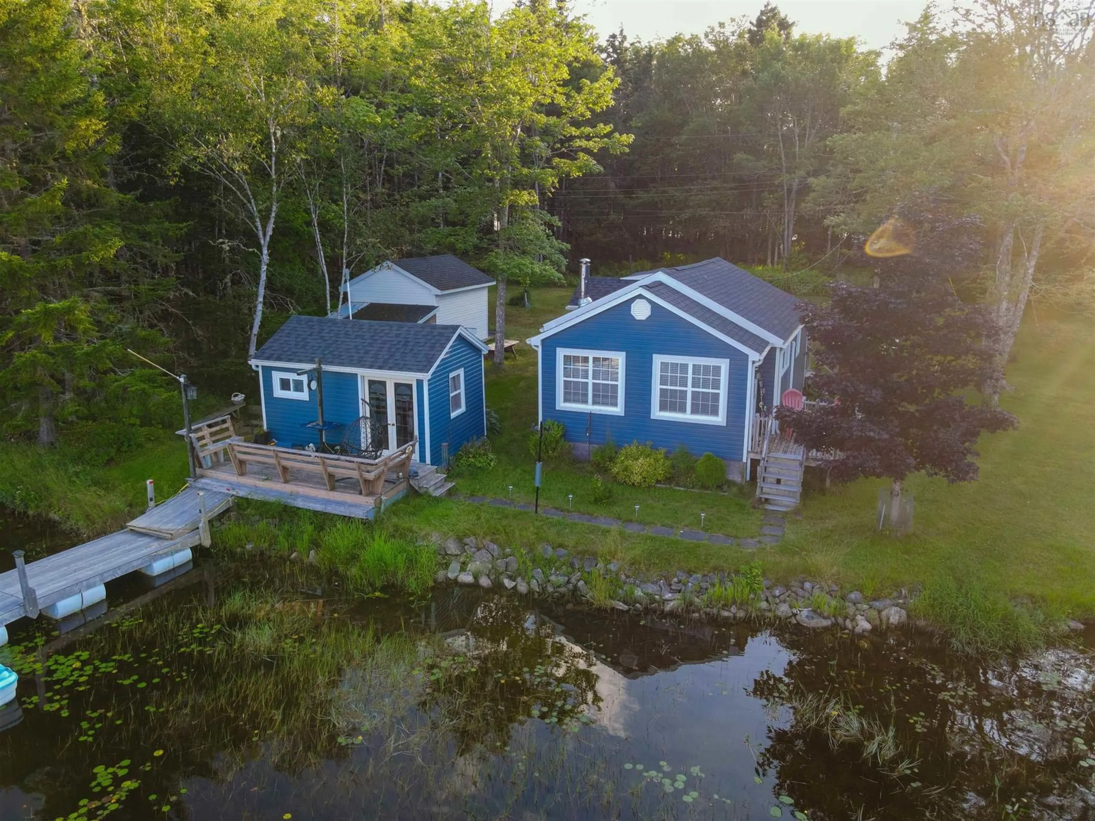 A pic from outside/outdoor area/front of a property/back of a property/a pic from drone, water/lake/river/ocean view for 5 Johnson Rd, Mount Uniacke Nova Scotia B0N 1Z0