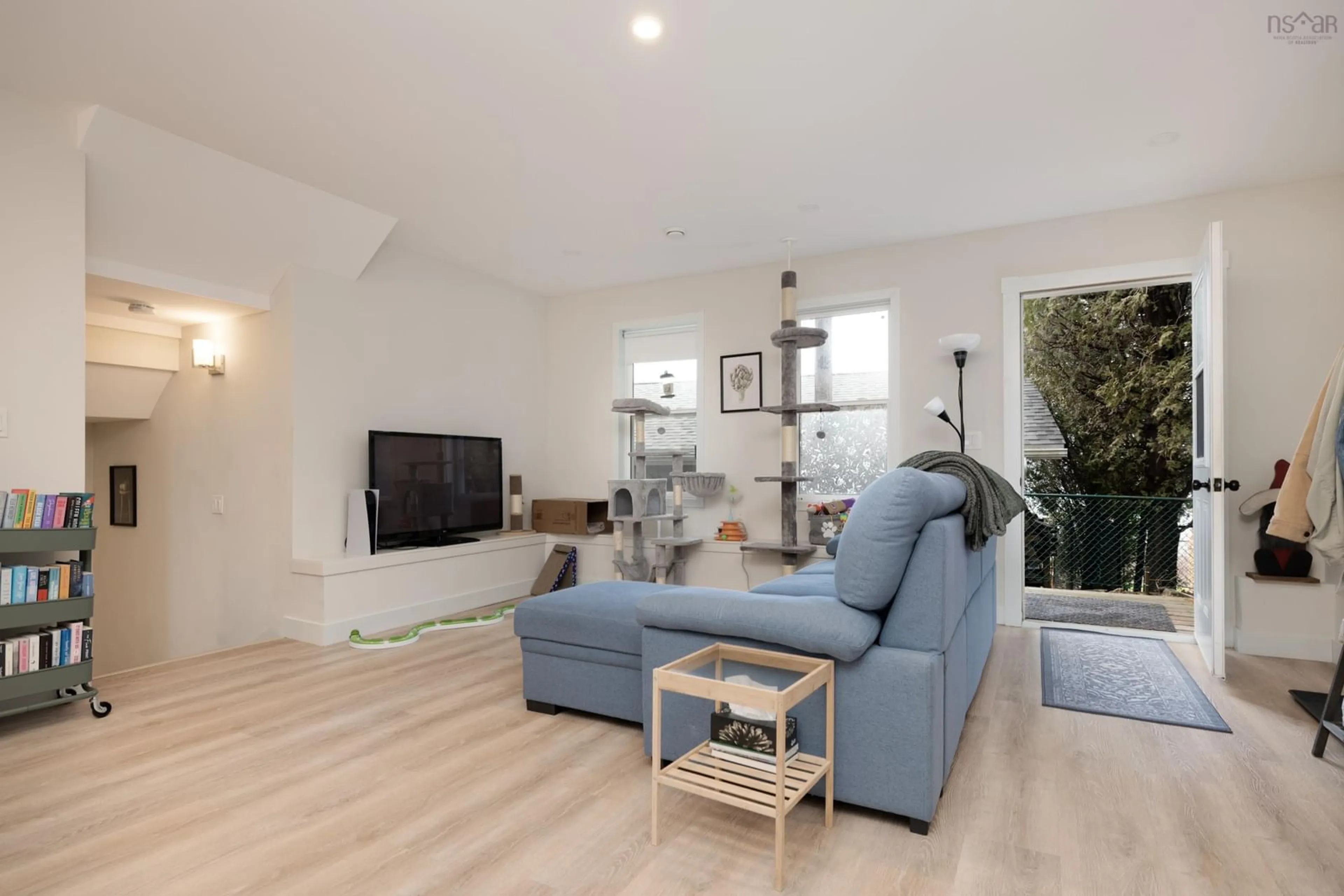 Living room with furniture, wood/laminate floor for 18 Stephen St, Dartmouth Nova Scotia B2Y 2L3