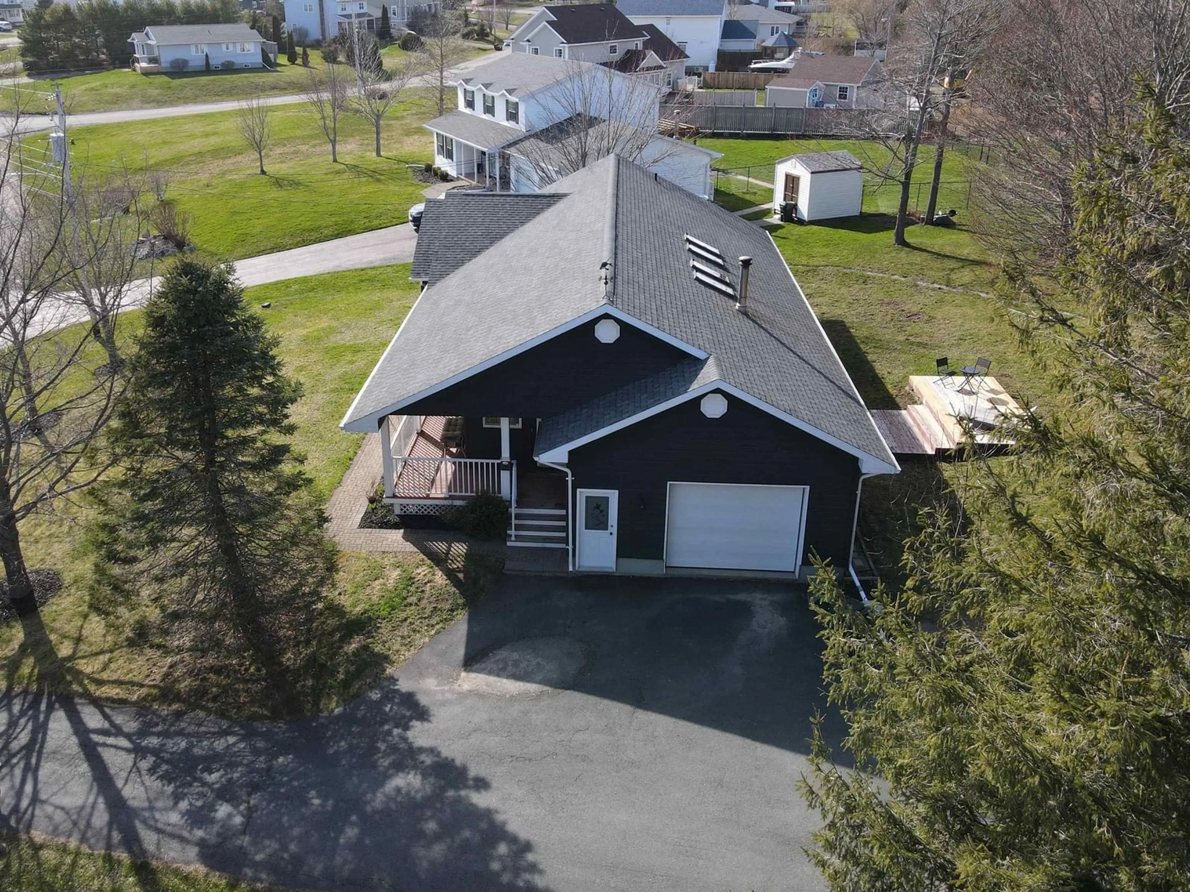 A pic from outside/outdoor area/front of a property/back of a property/a pic from drone, street for 9 Amberwood Cres, Westmount Nova Scotia B1R 2L1