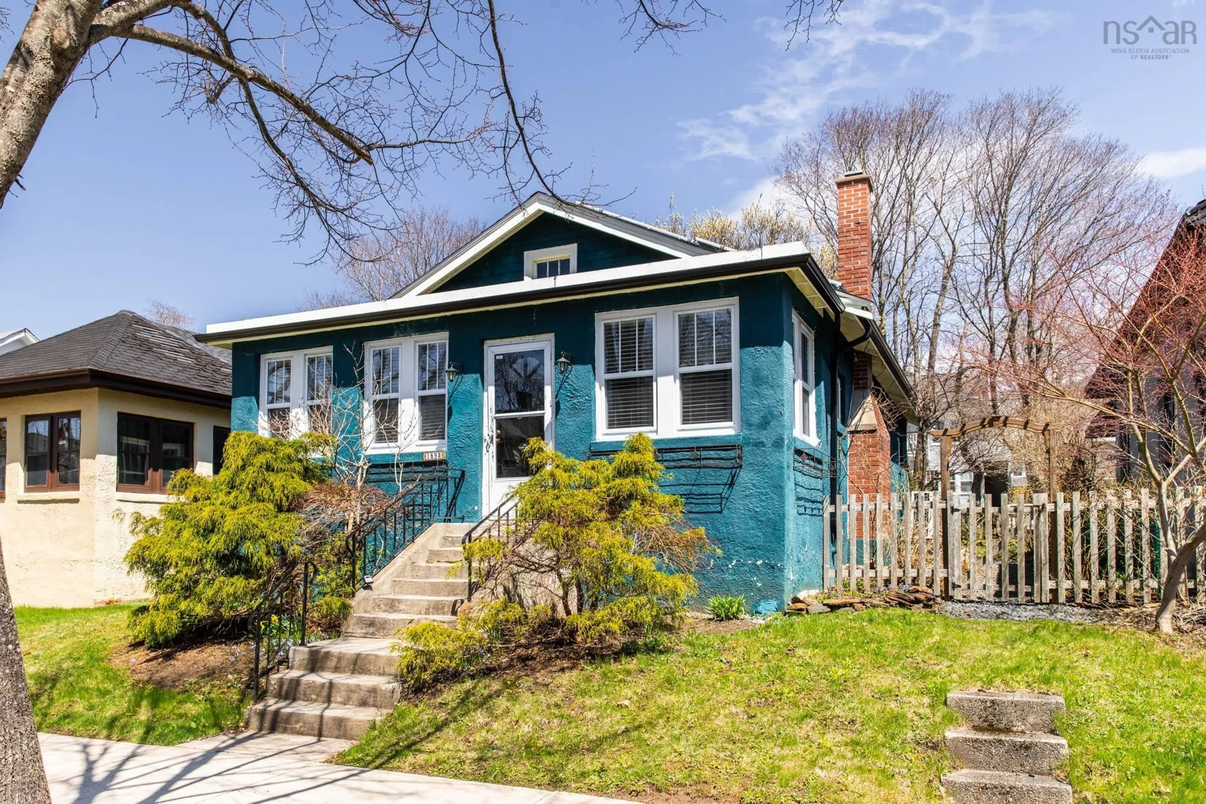 Home with vinyl exterior material, street for 1593 Preston St, Halifax Nova Scotia B3H 3T9