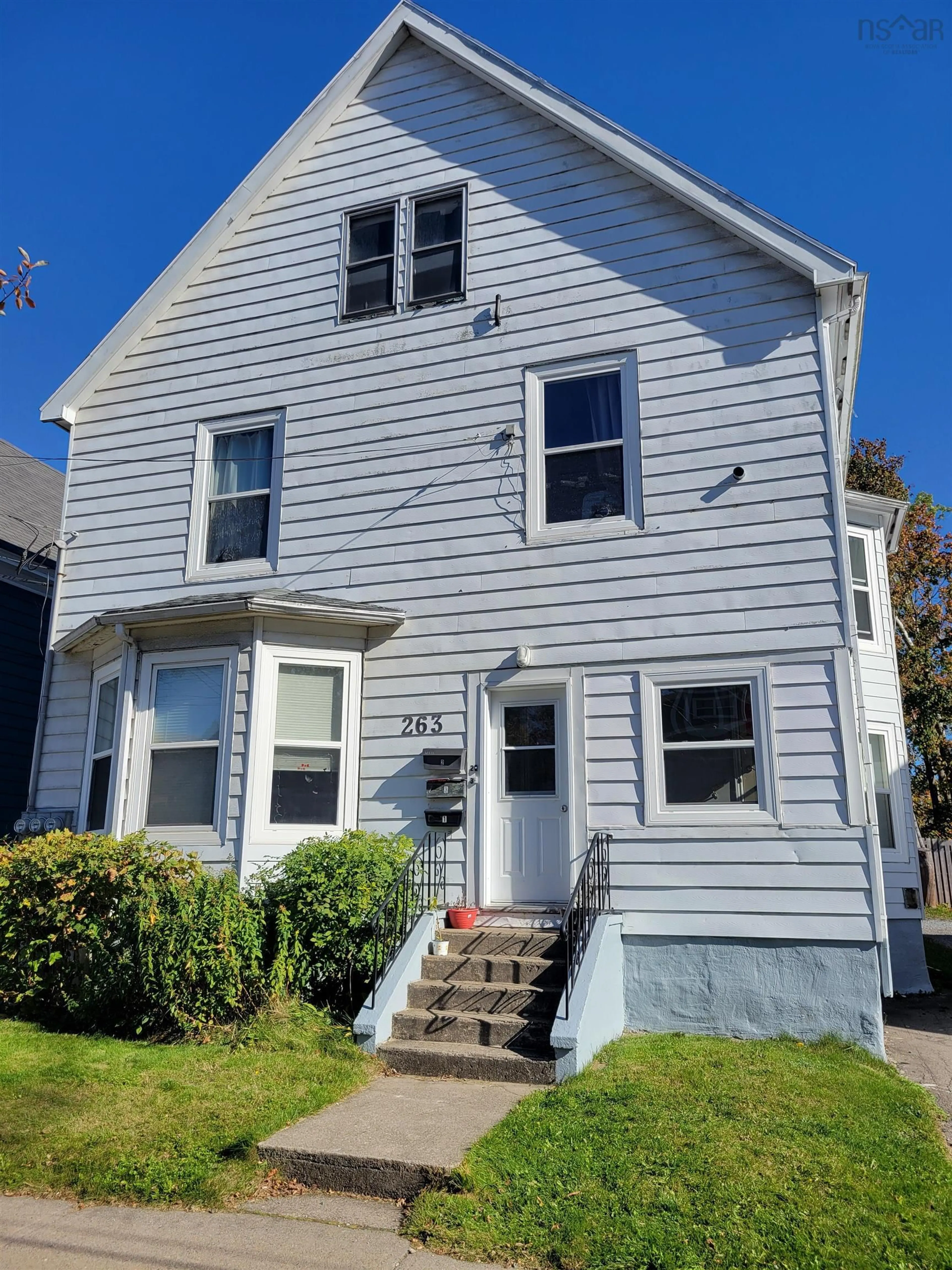 Home with vinyl exterior material, street for 263 Bentinck St, Sydney Nova Scotia B1P 1G8