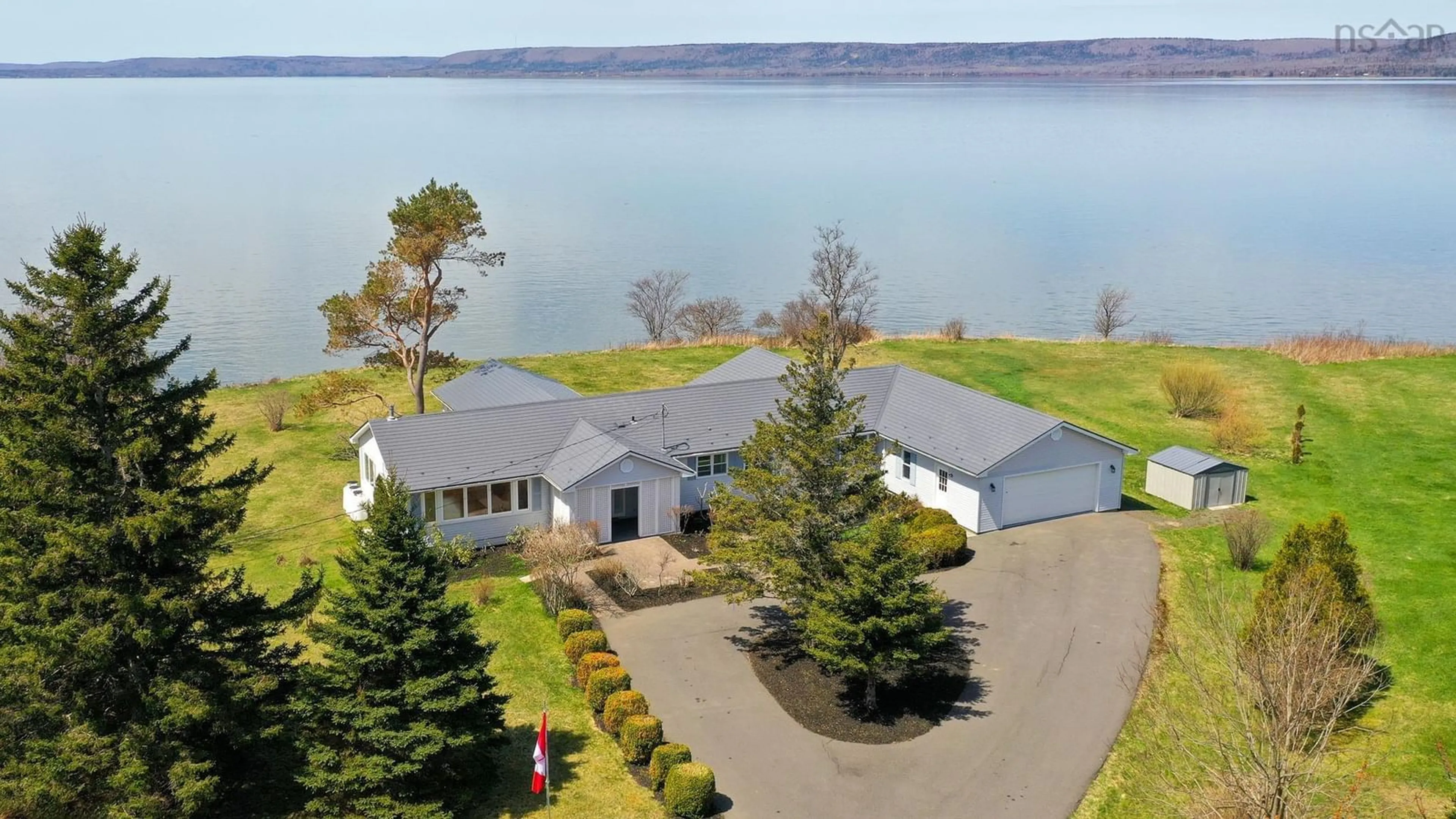 A pic from outside/outdoor area/front of a property/back of a property/a pic from drone, water/lake/river/ocean view for 27 Twin Cove Rd, Clementsport Nova Scotia B0S 1E0