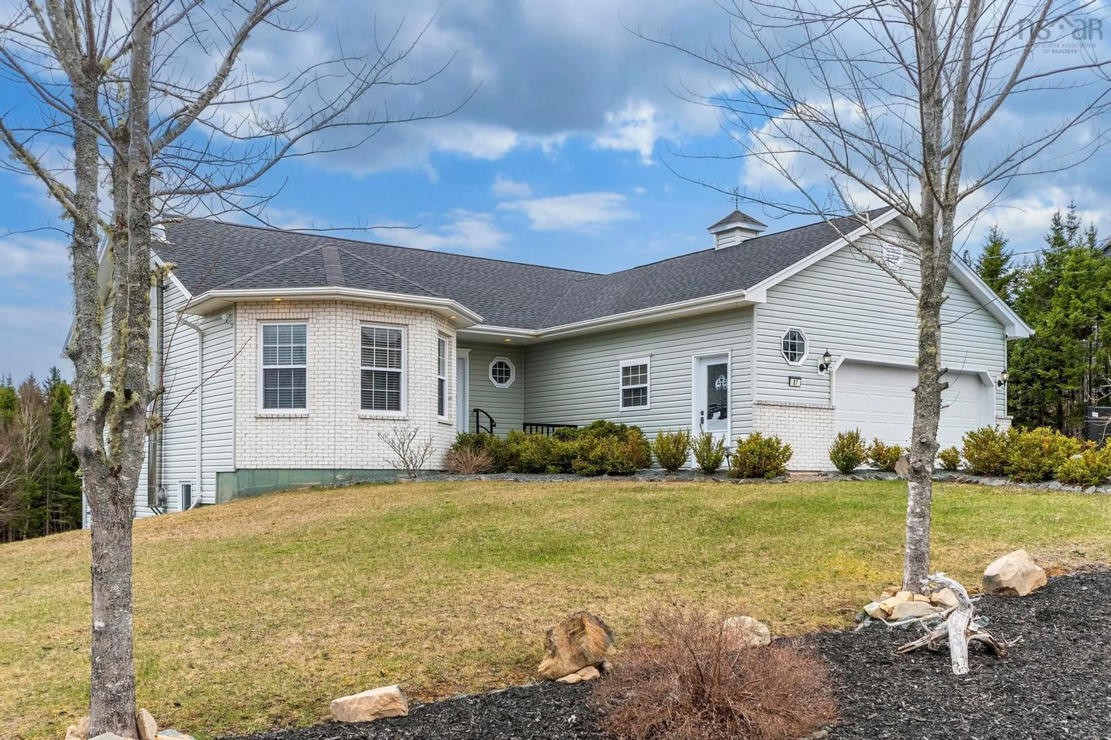 Home with vinyl exterior material, street for 87 Candlewood Dr, Porters Lake Nova Scotia B3E 1H5