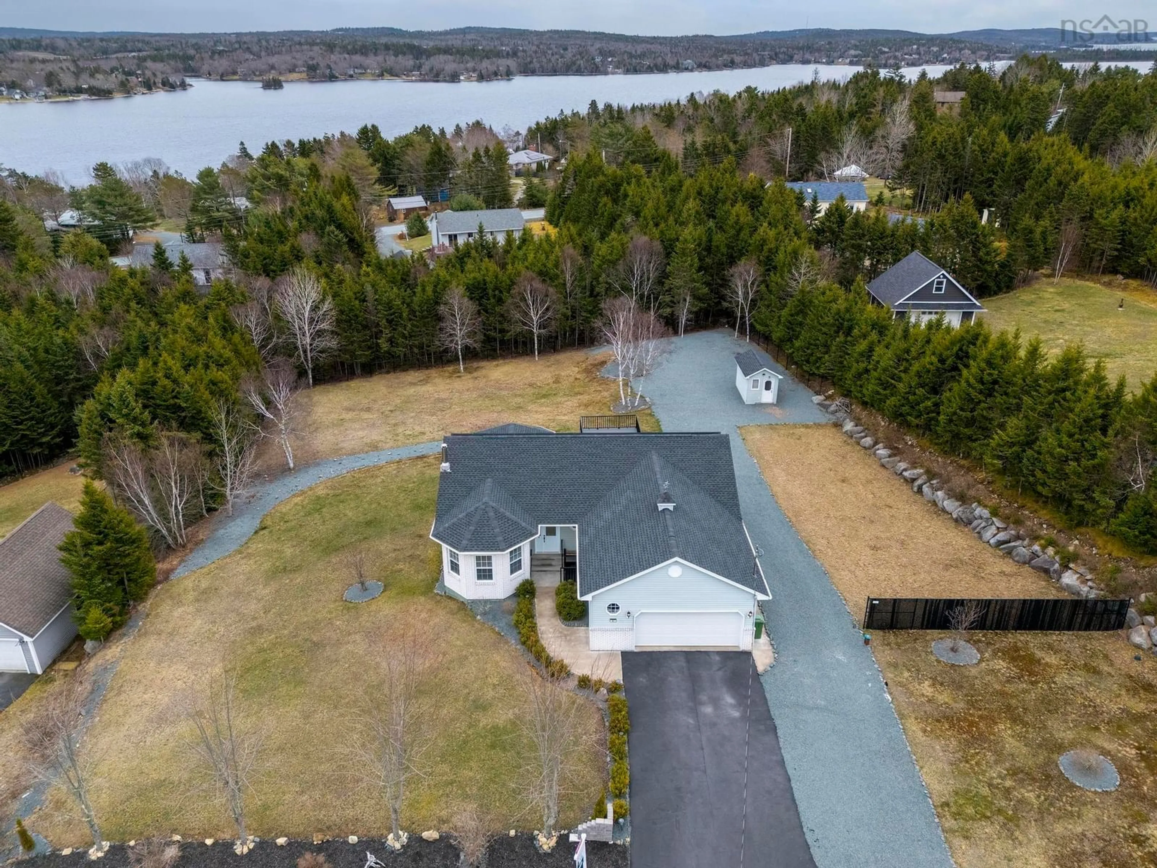 A pic from outside/outdoor area/front of a property/back of a property/a pic from drone, water/lake/river/ocean view for 87 Candlewood Dr, Porters Lake Nova Scotia B3E 1H5