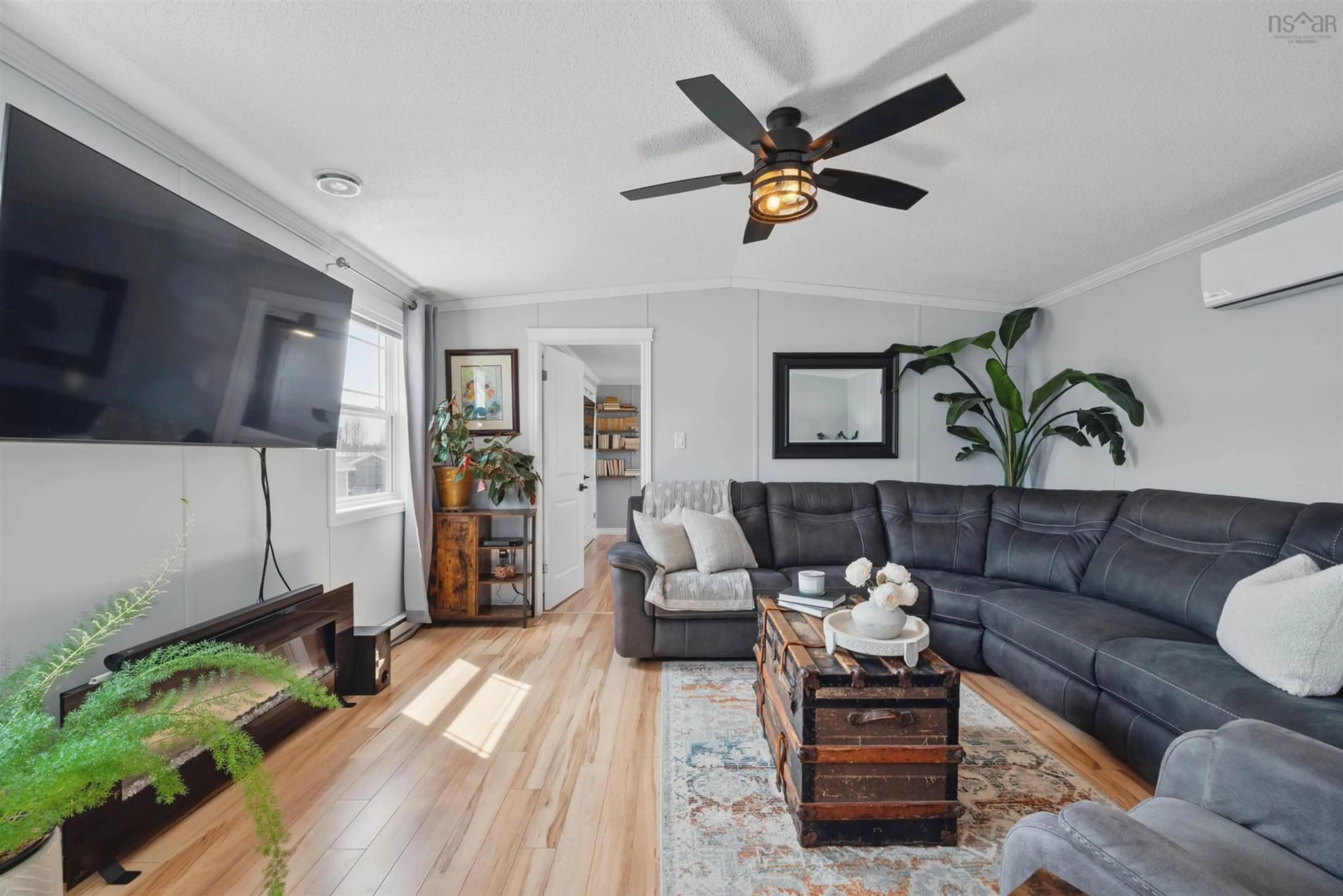Living room with furniture, wood/laminate floor for 31 Empire Loop, Truro Nova Scotia B2N 7B5