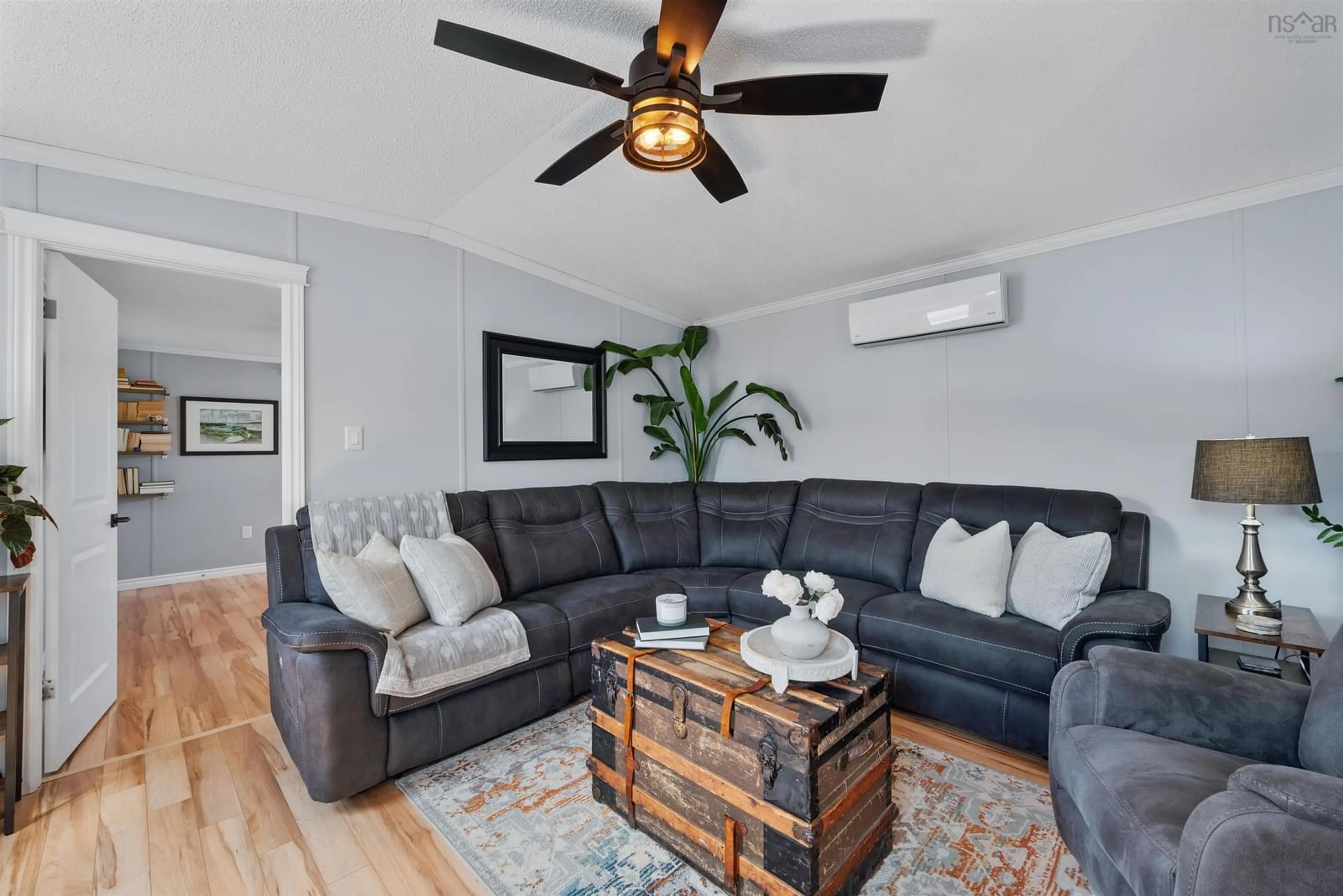 Living room with furniture, wood/laminate floor for 31 Empire Loop, Truro Nova Scotia B2N 7B5