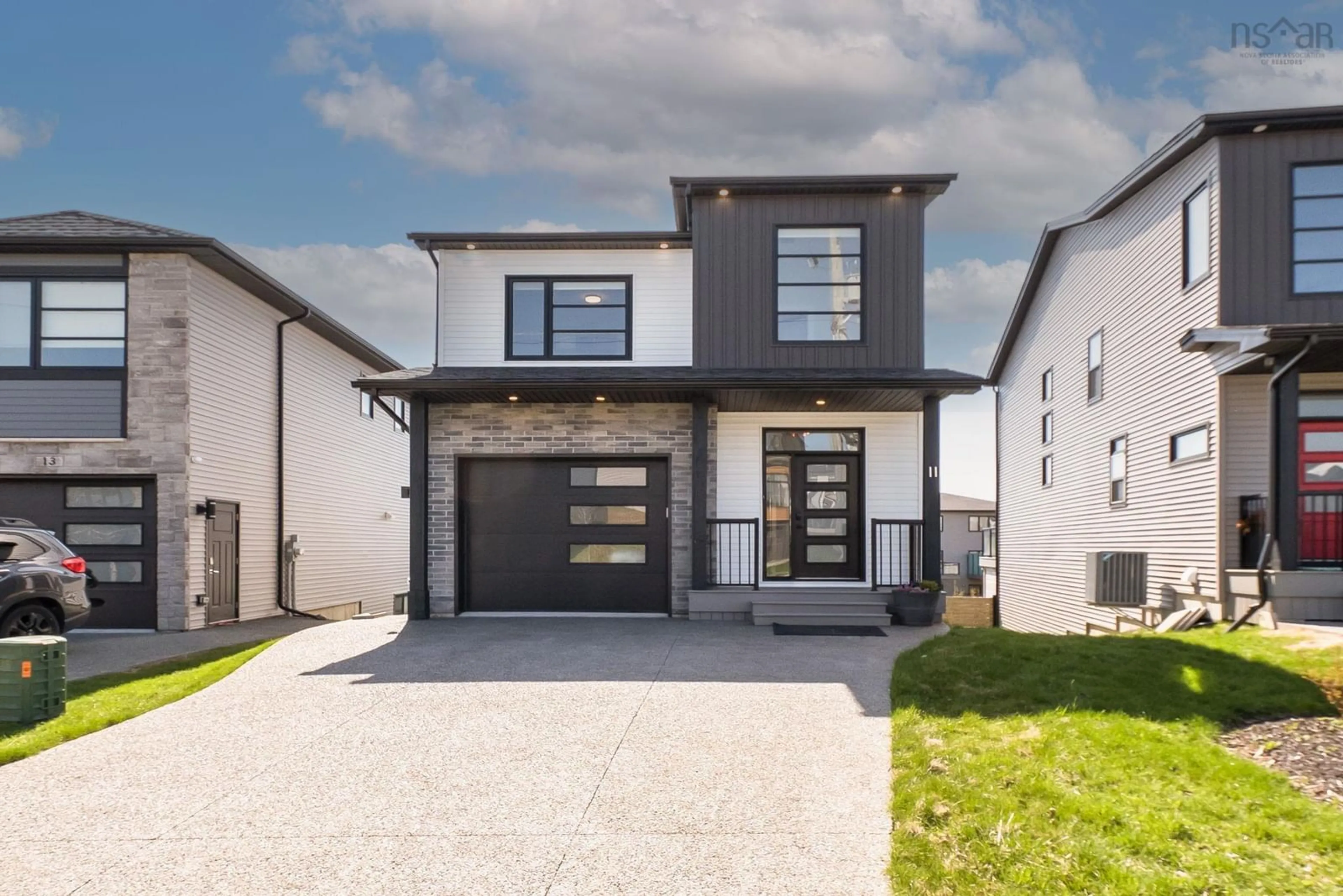 Home with brick exterior material, street for 11 Darjeeling Dr, Long Lake Nova Scotia B3P 0J9