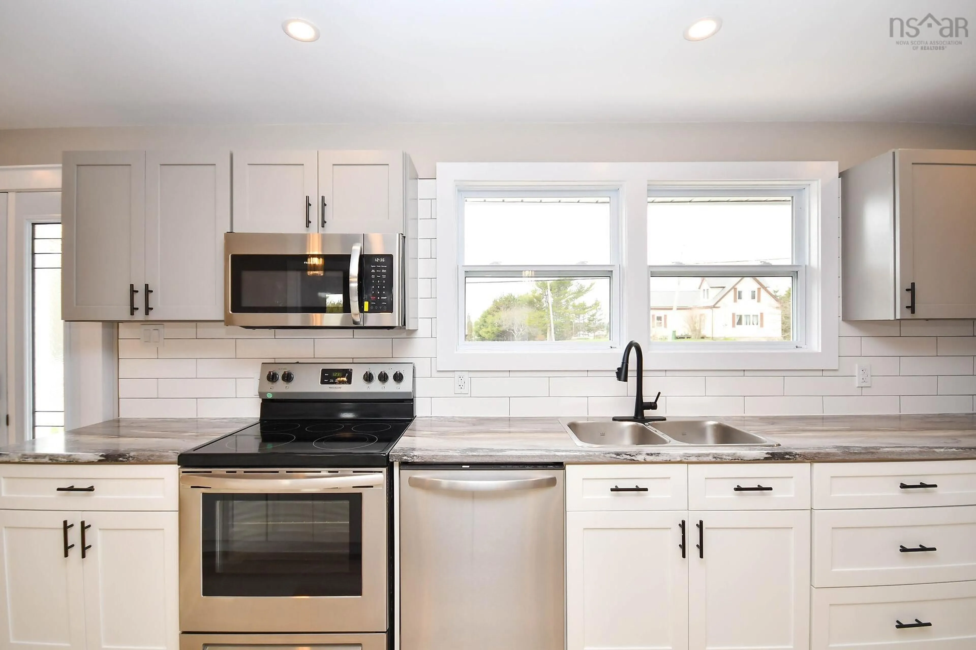 Open concept kitchen, ceramic/tile floor for 839 East Chezzetcook Rd, East Chezzetcook Nova Scotia B0J 2L0