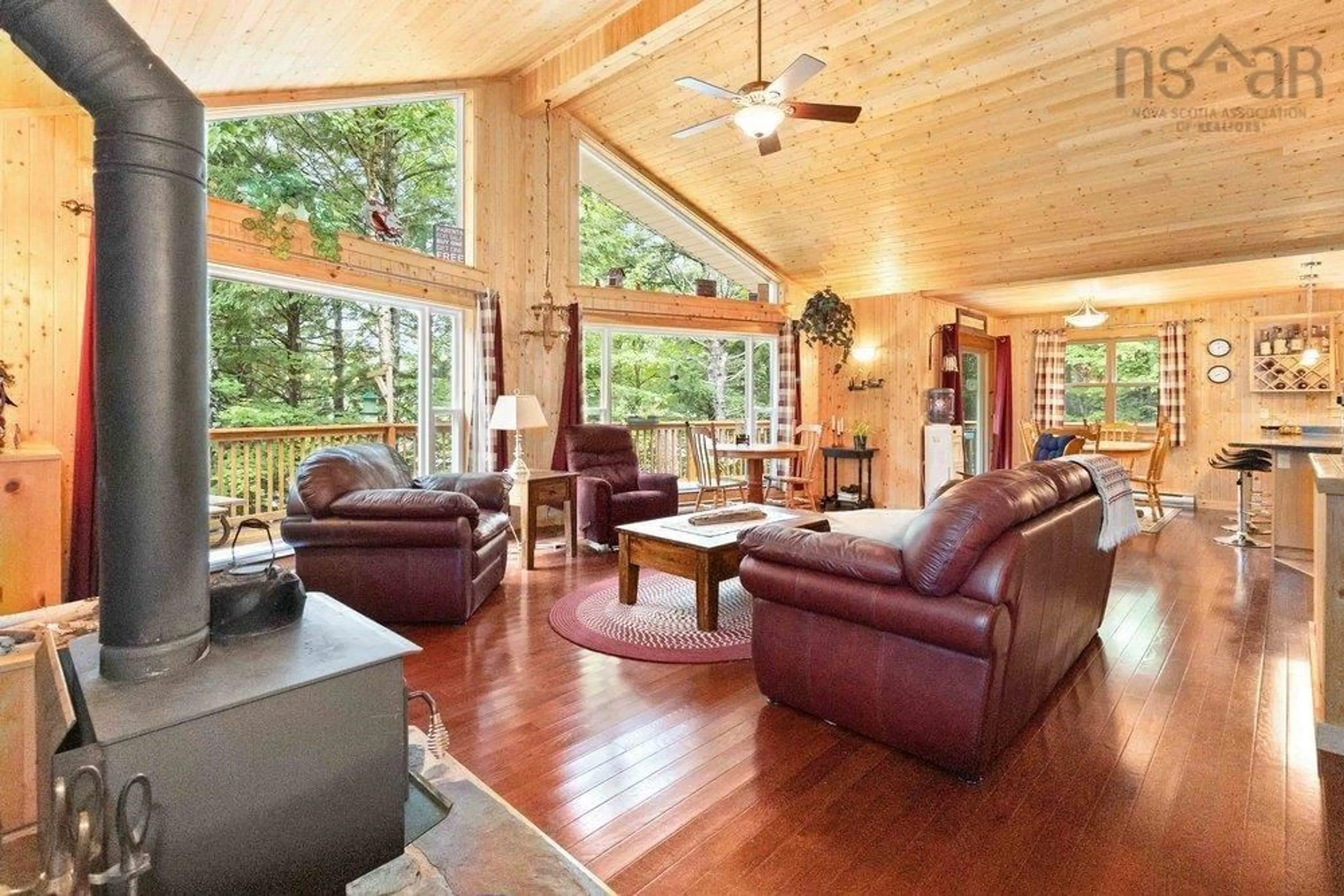 Living room with furniture, wood/laminate floor for 93 South Point Lane, Franey Corner Nova Scotia B0R 1A0