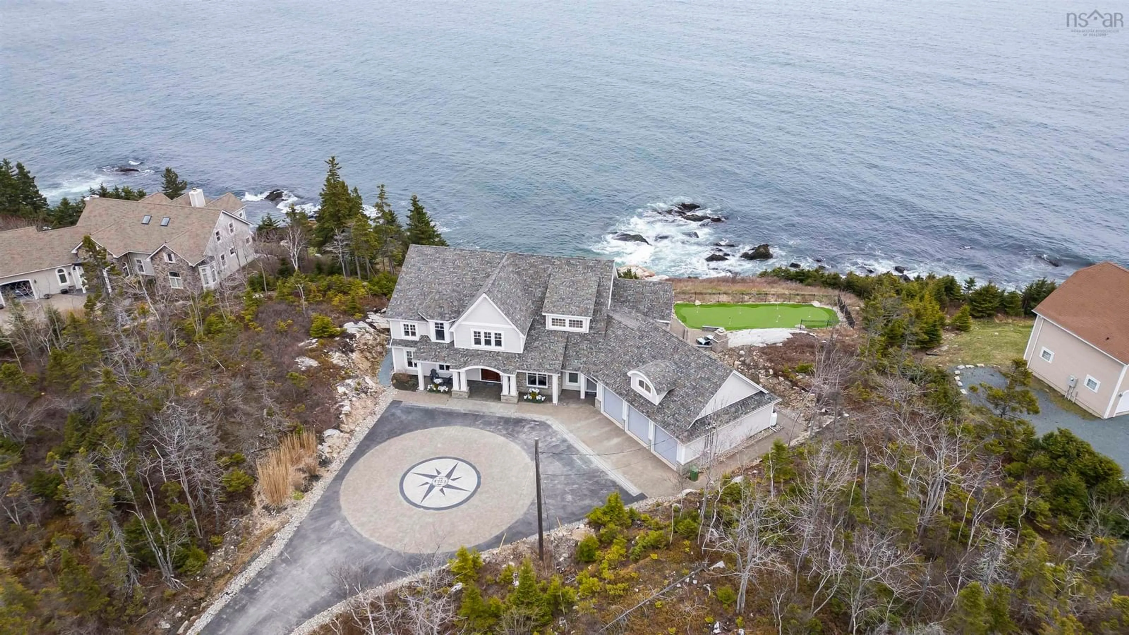 A pic from outside/outdoor area/front of a property/back of a property/a pic from drone, water/lake/river/ocean view for 21 Saltspray Lane, Halibut Bay Nova Scotia B3V 0B1